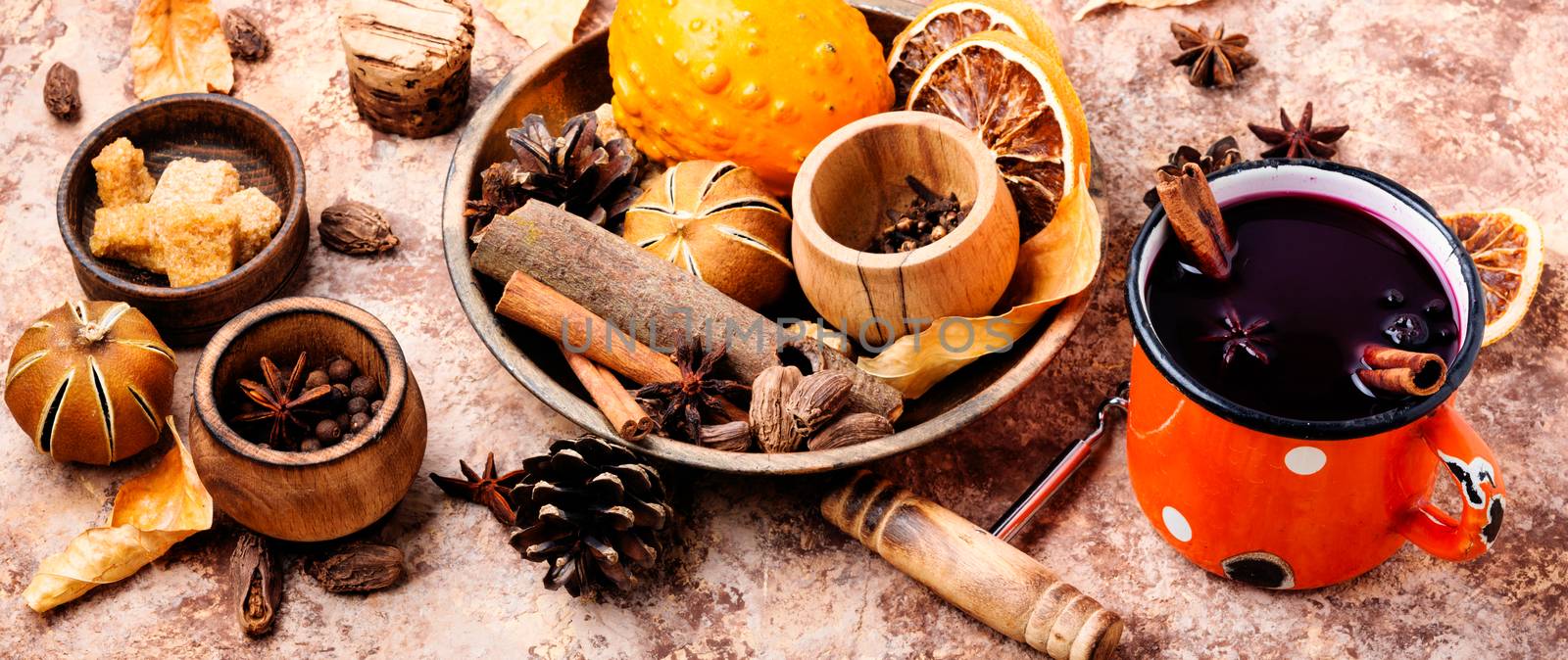 Autumn mulled wine in mug by LMykola