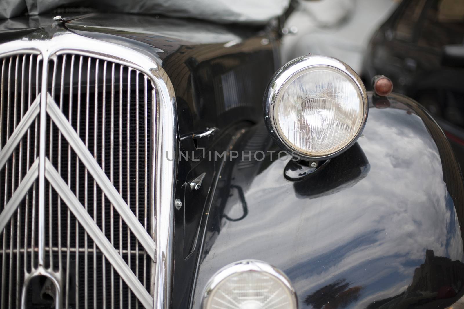 Close-up of headlights classic vintage car. Exhibition by Vanzyst