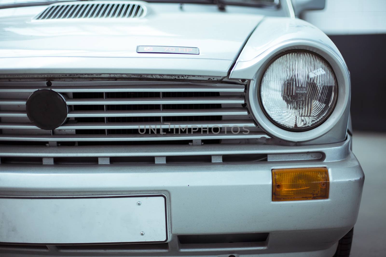 Close-up of headlights classic vintage car. Exhibition by Vanzyst