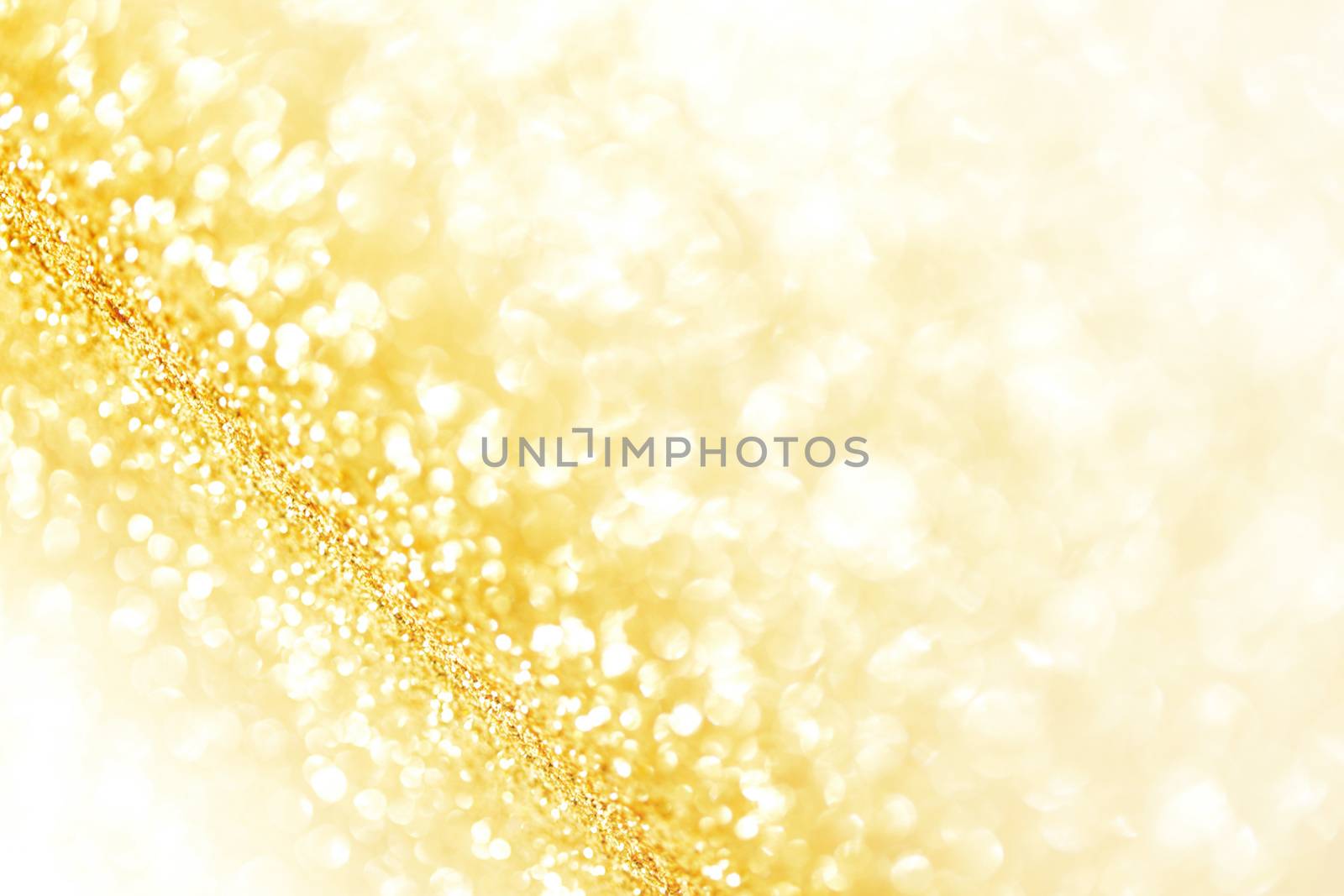 Abstract glitter bokeh holiday golden background