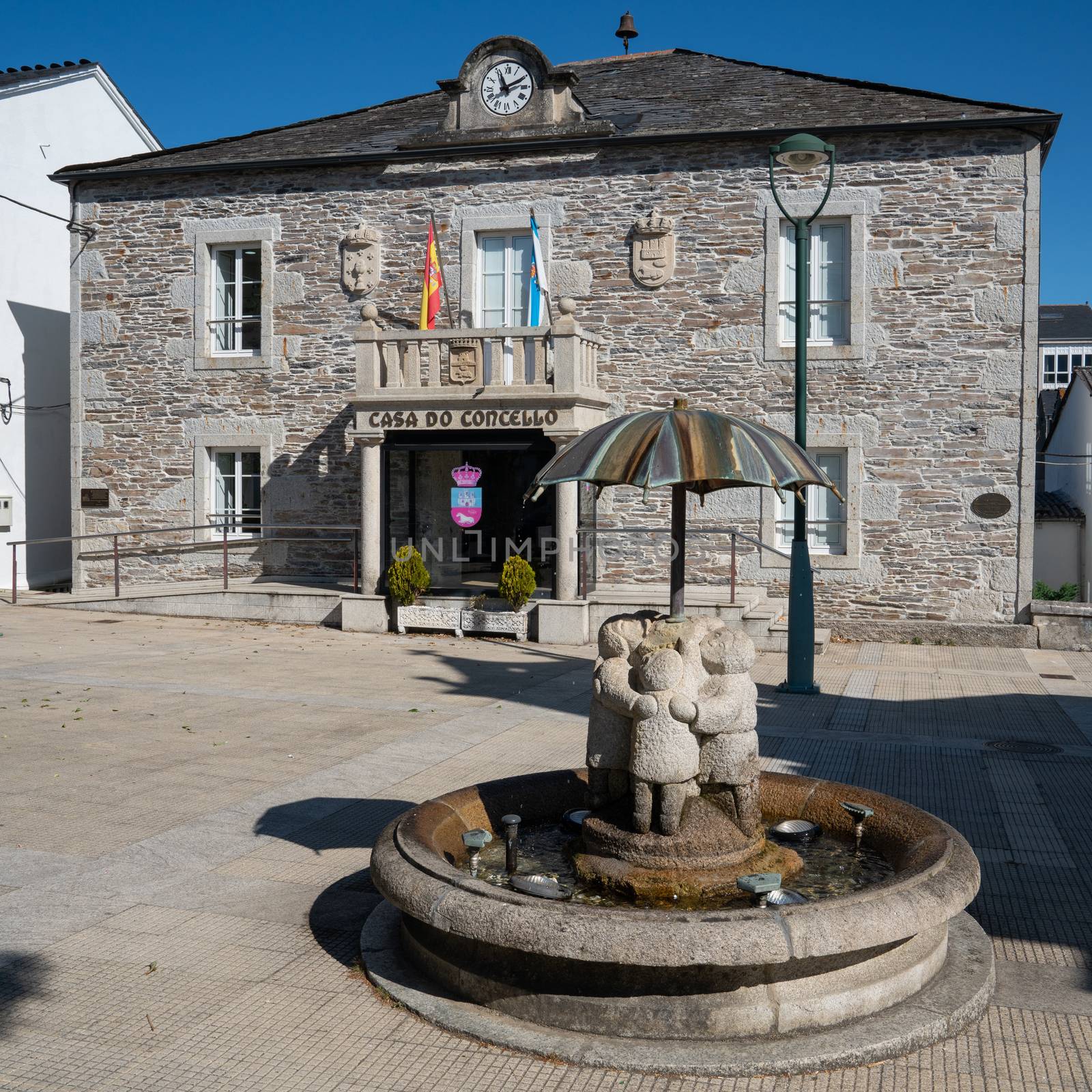 Historic townhall of Castroverde with children water well, Camino de Santiago trail, Calicia, Spain