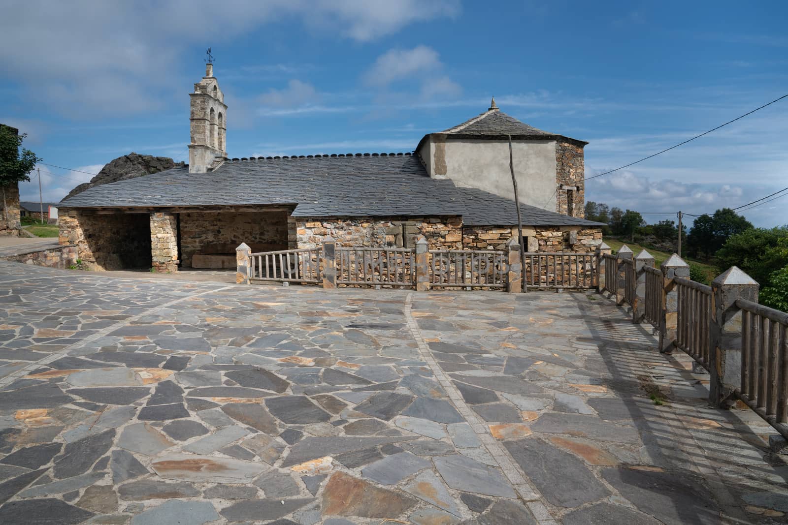 Old church Santa Maria Magdalena in sunlight with blue sky, Penafonte, Camino de Santiago close to Grandas de Salime, Asturias, Spain
