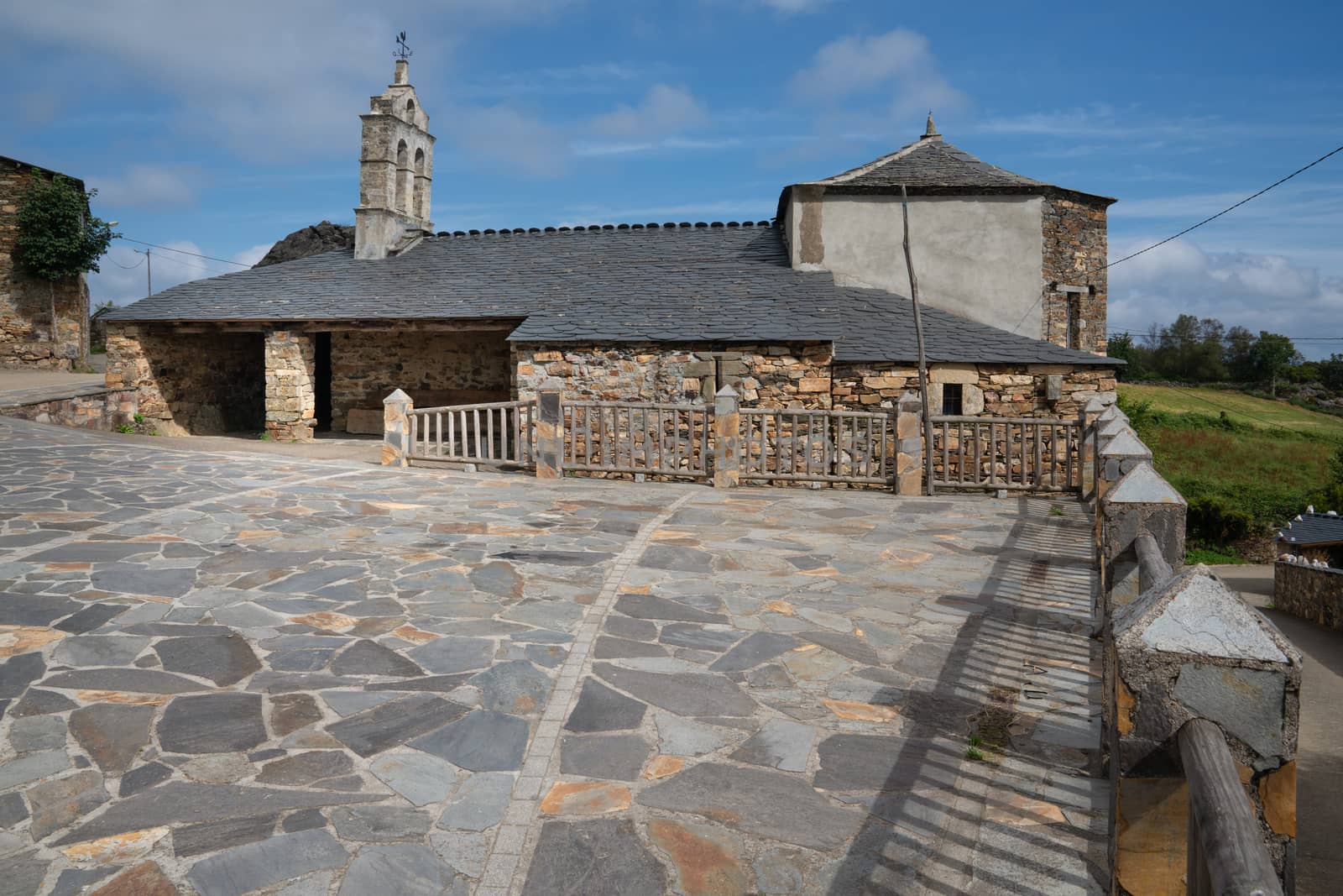 Old church Santa Maria Magdalena in sunlight with blue sky, Penafonte, Camino de Santiago close to Grandas de Salime, Asturias, Spain