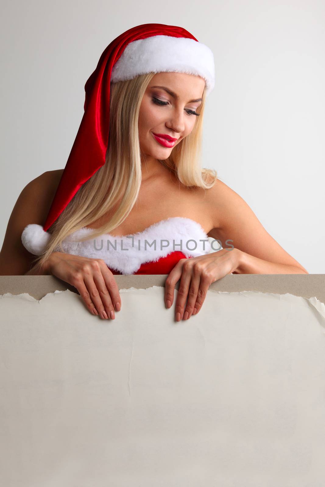 Santa girl holding blank billboard by ALotOfPeople