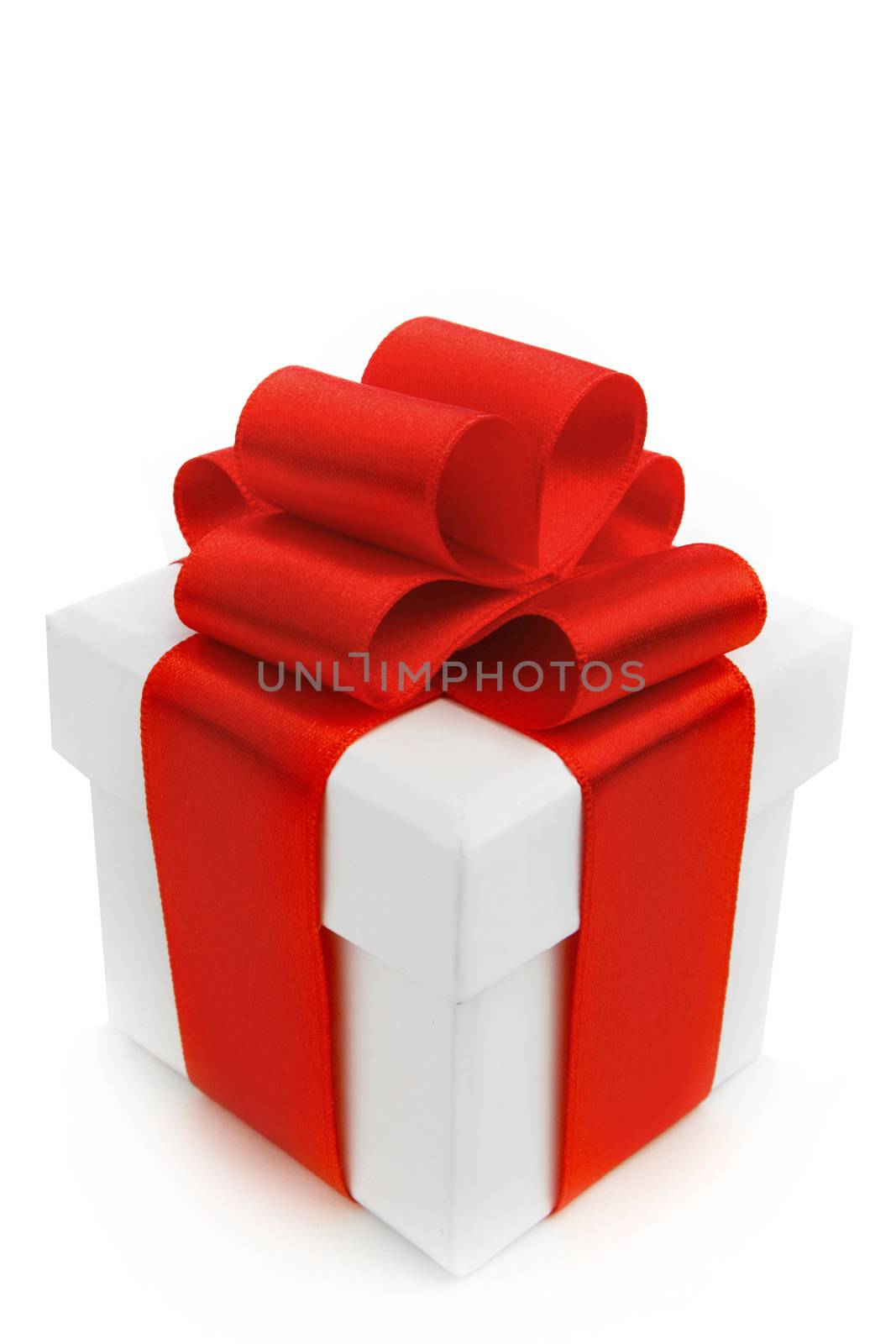 One white gift box with red bow isolated on white background