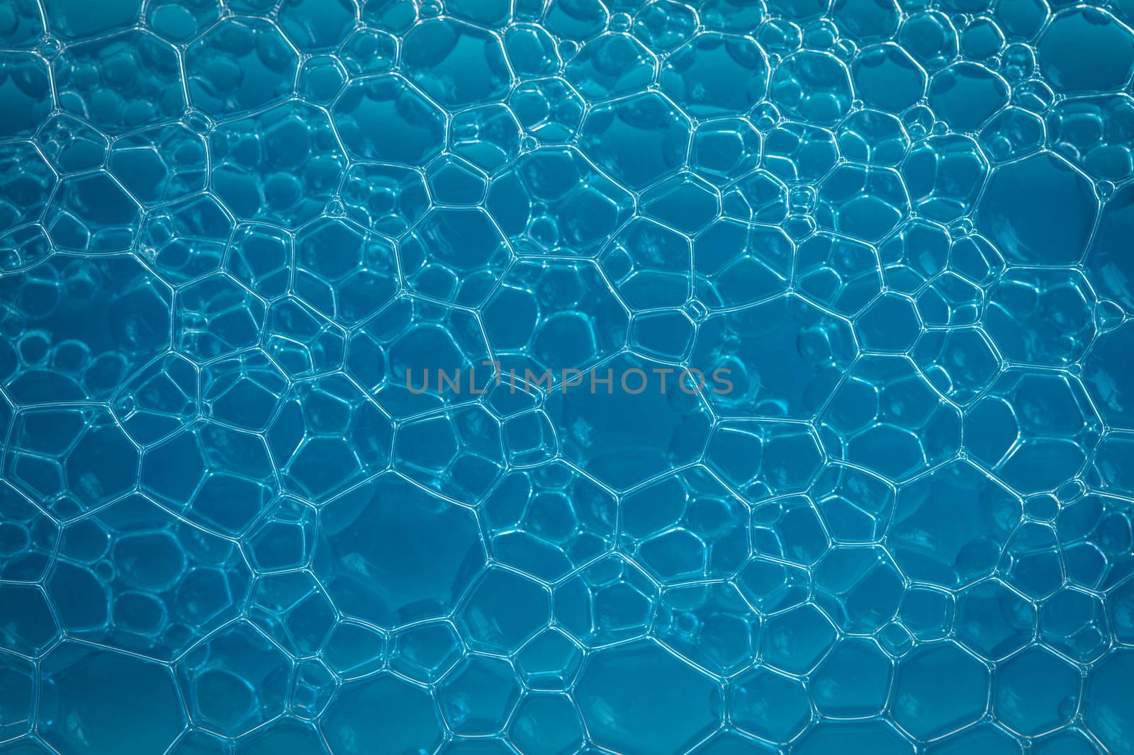 texture of blue soap foam closeup by MegaArt