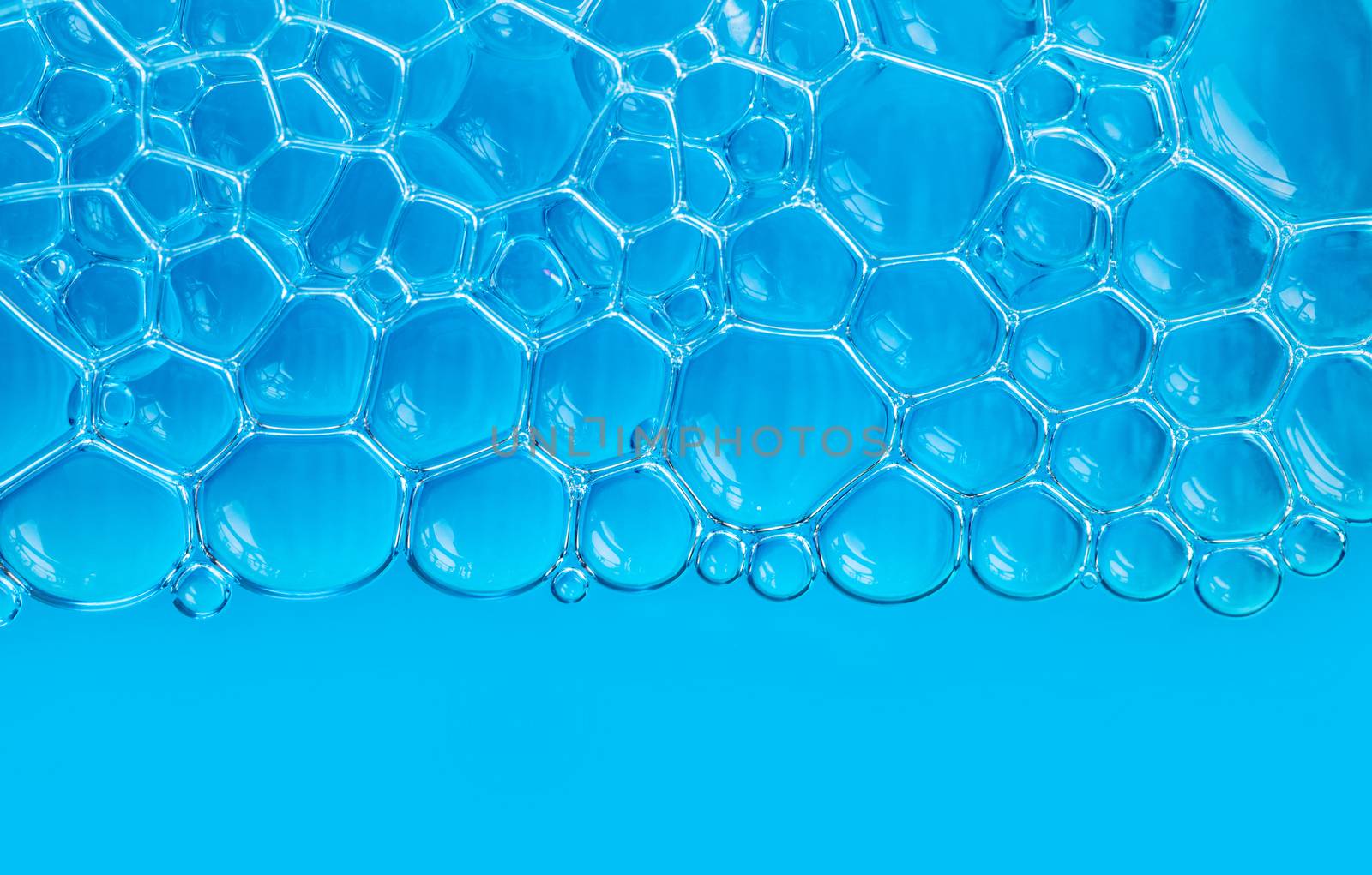 texture of blue soap foam closeup by MegaArt