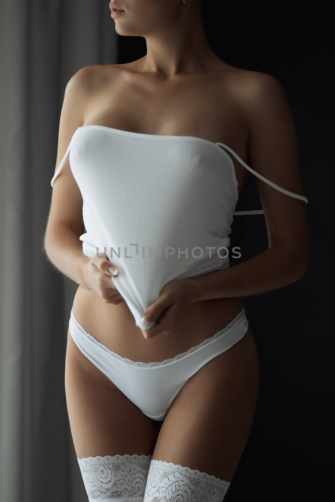 Girl with big Breasts in white lingerie
