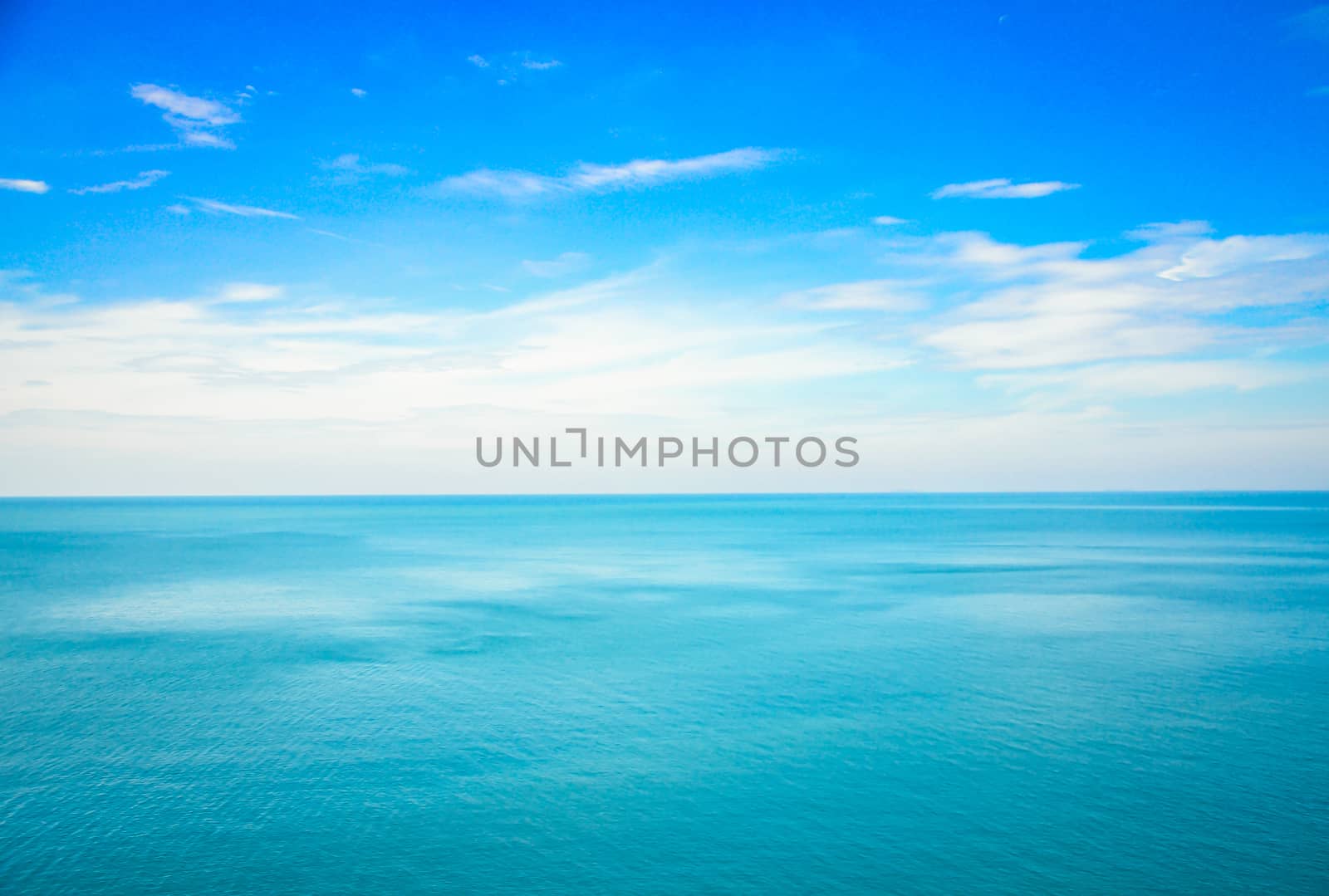 Blue ocean sea with blue sky background, copy space.