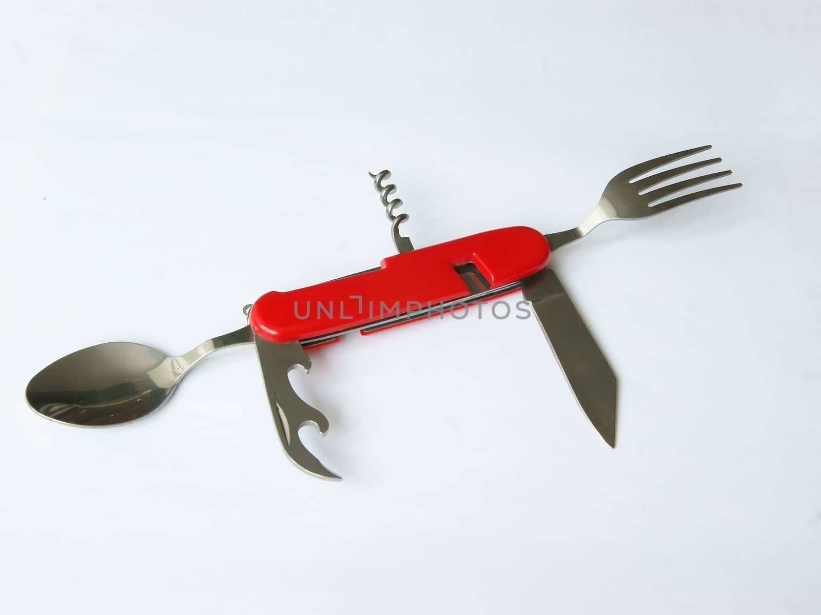 Foldable tourist knife, fork, spoon and corkscrew, a key for opening bottles and cans