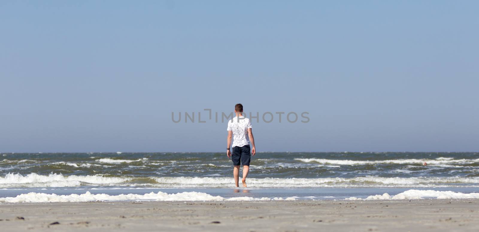 Dutch man on a beach by michaklootwijk
