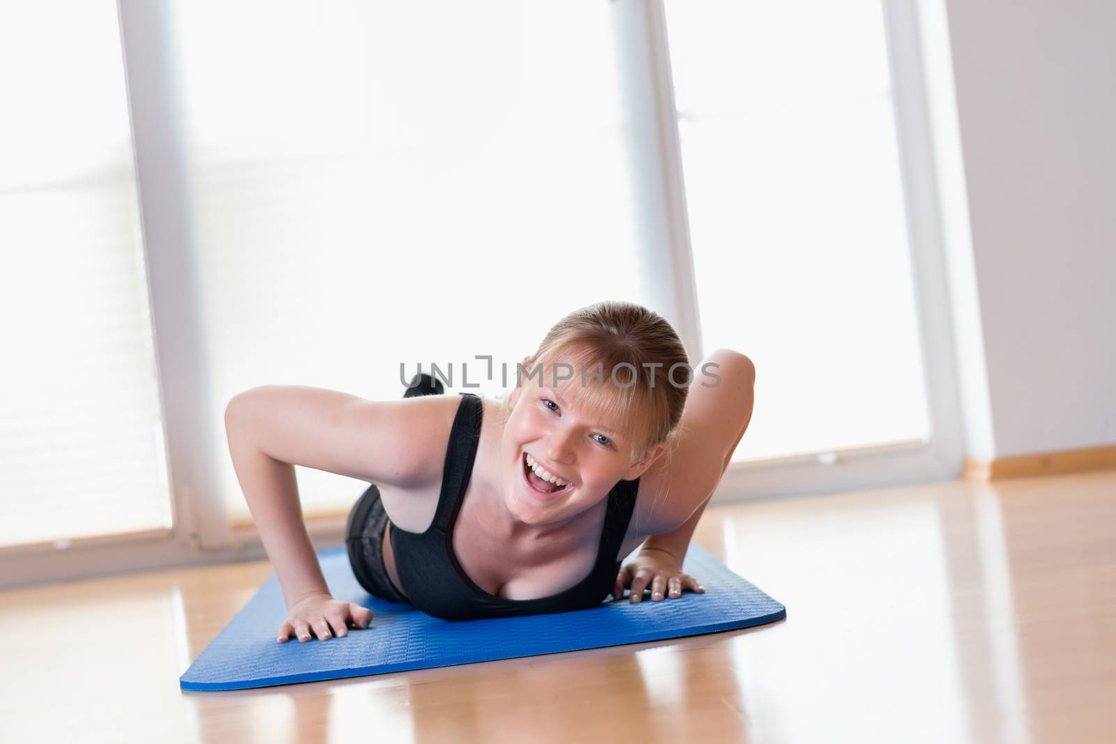 Girl doing pushups exercises by w20er