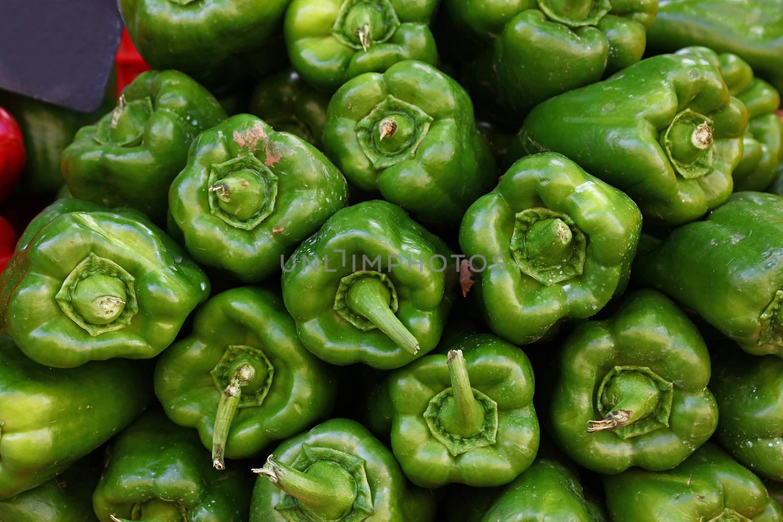 Close up fresh green bell peppers by BreakingTheWalls