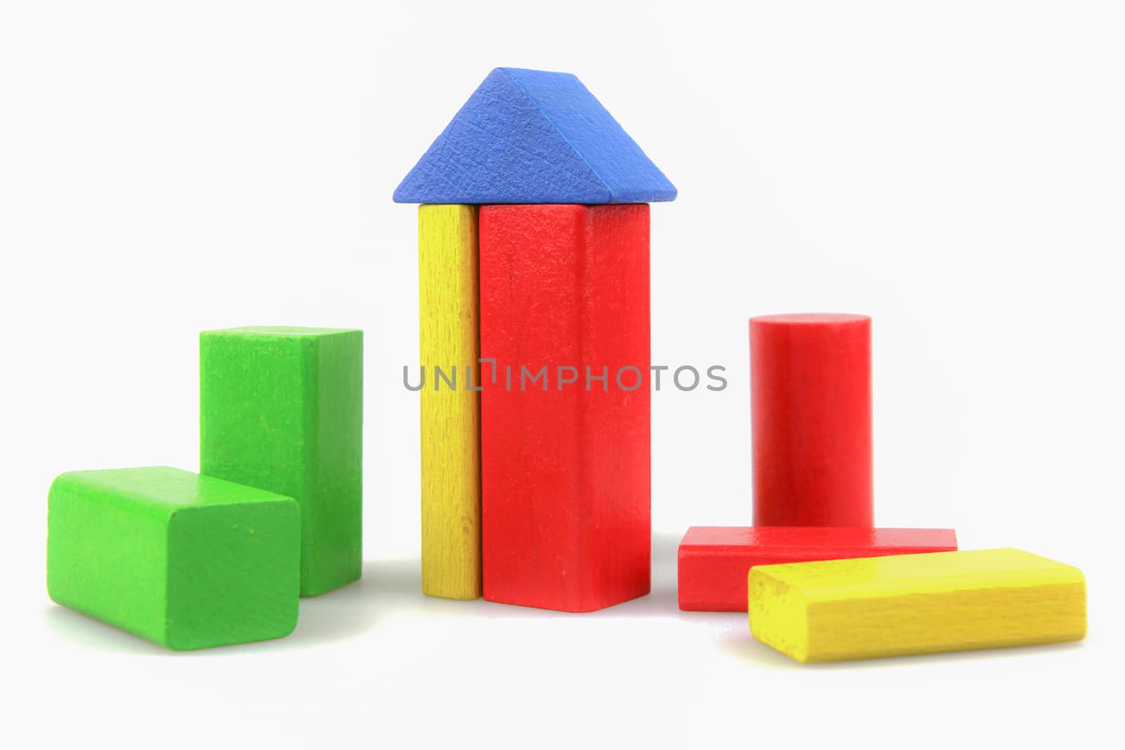 Colorful Wooden Building Blocks Toys Isolated On White by nenovbrothers