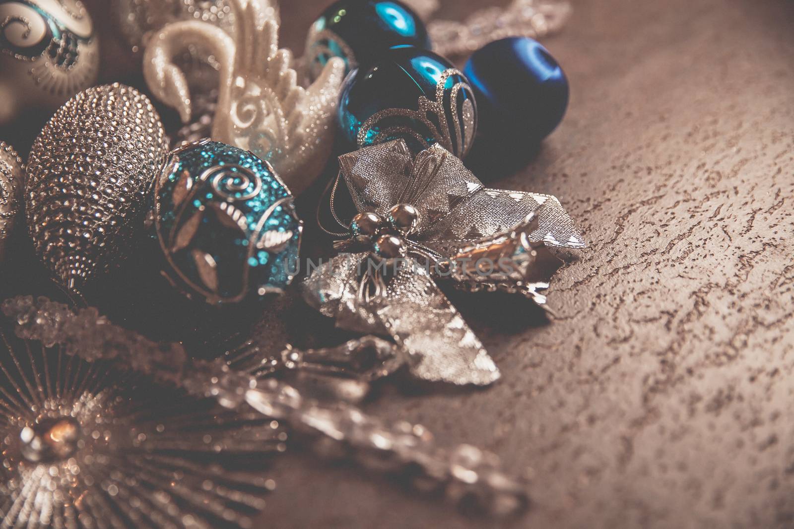 Beautiful silver and blue christmas balls for 2019 New Year on a dark background. Copy space