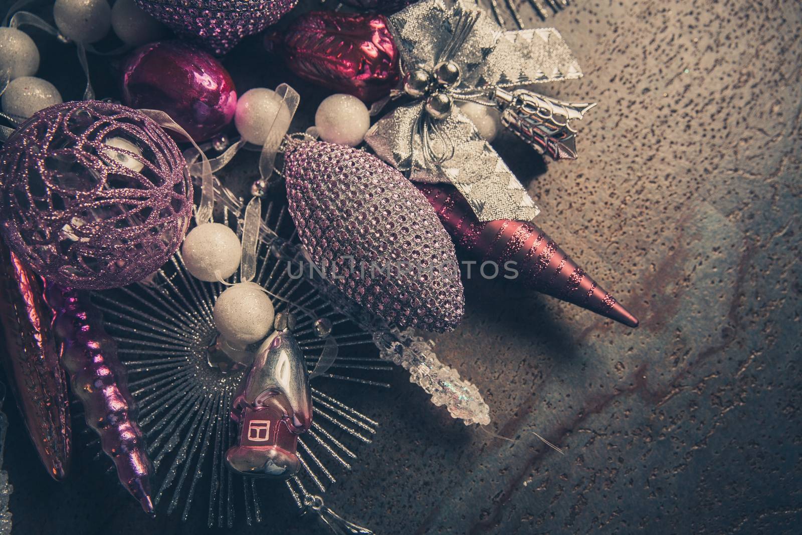 vintage christmas 2019 background with colorful toys on dark surface