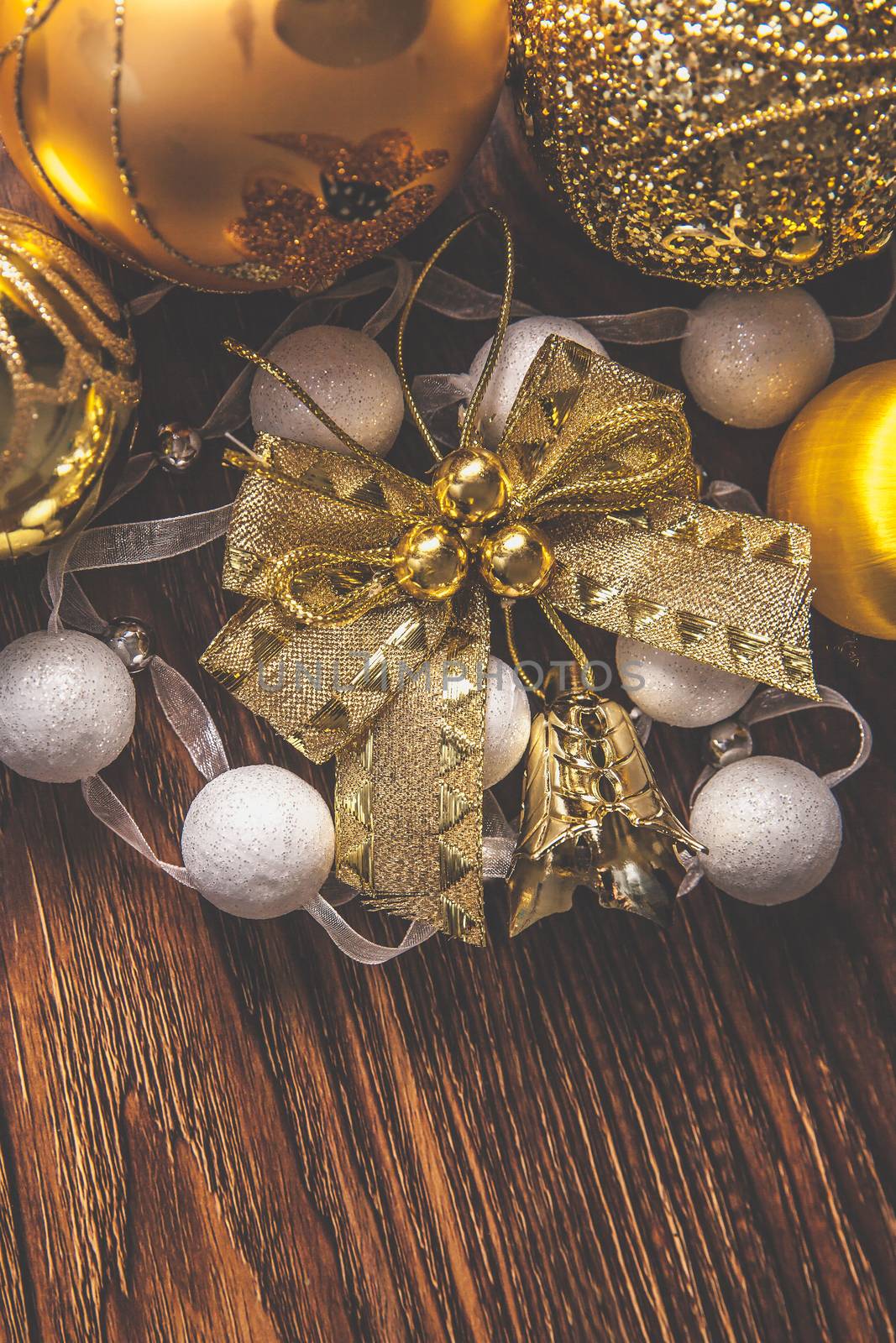 Sparkling golden toys For Christmas 2019 on dark backfround by mi_viri
