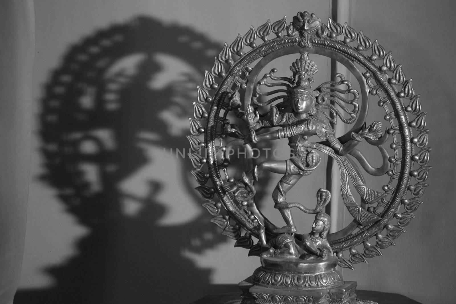 An antique metal sculpture of the dancing god Shiva also known as the Natraj or Natraja, woshipped by dancers following traditional danceforms of India.