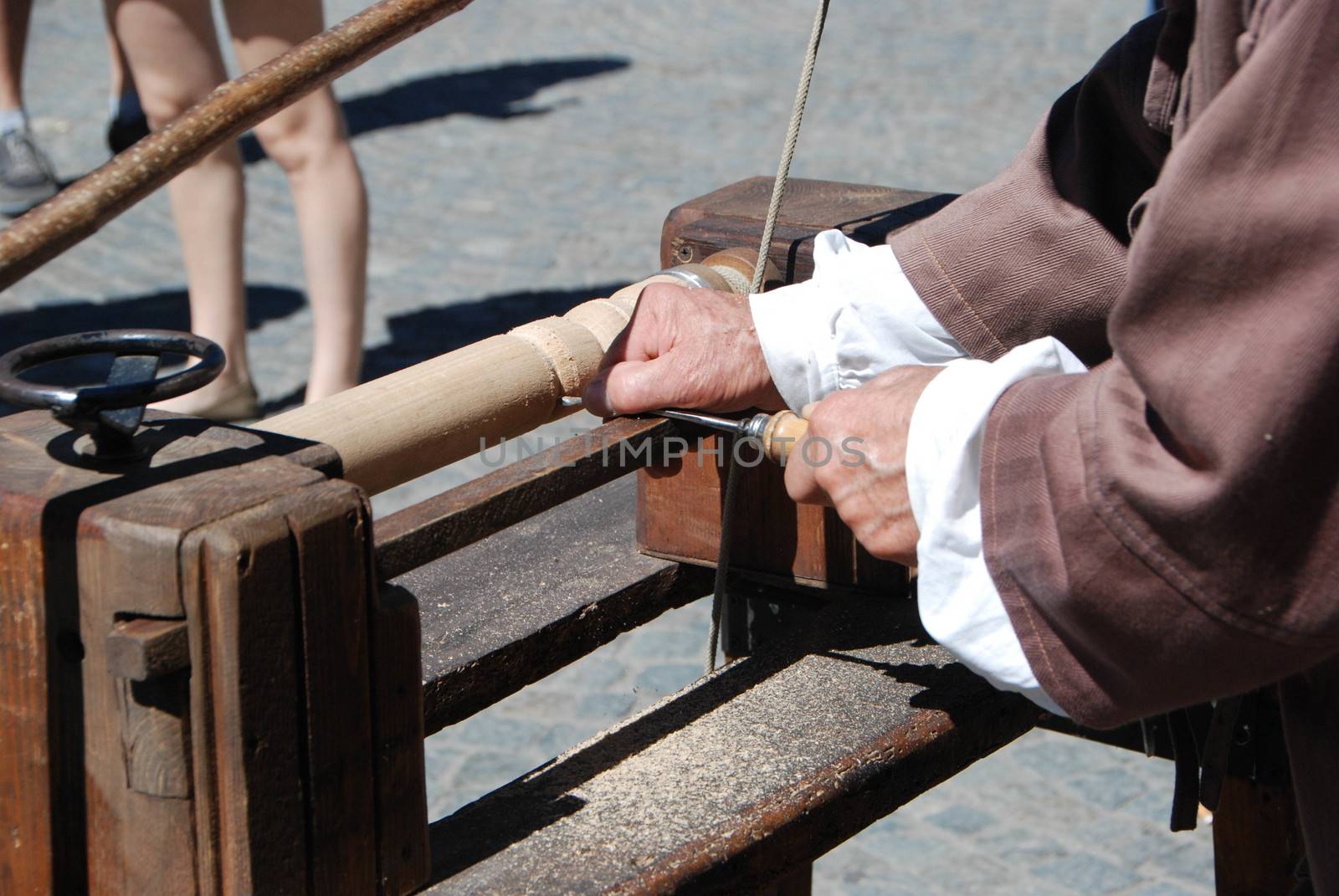 Turner works at one leg of a table