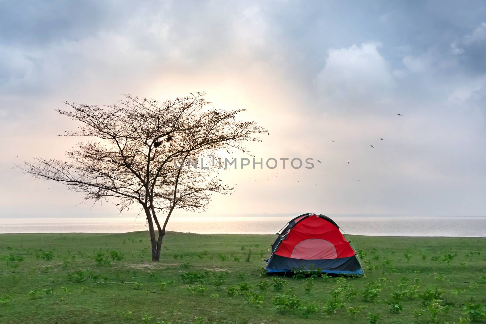 Beautiful scence  camping tent near the lake and sky with clouds