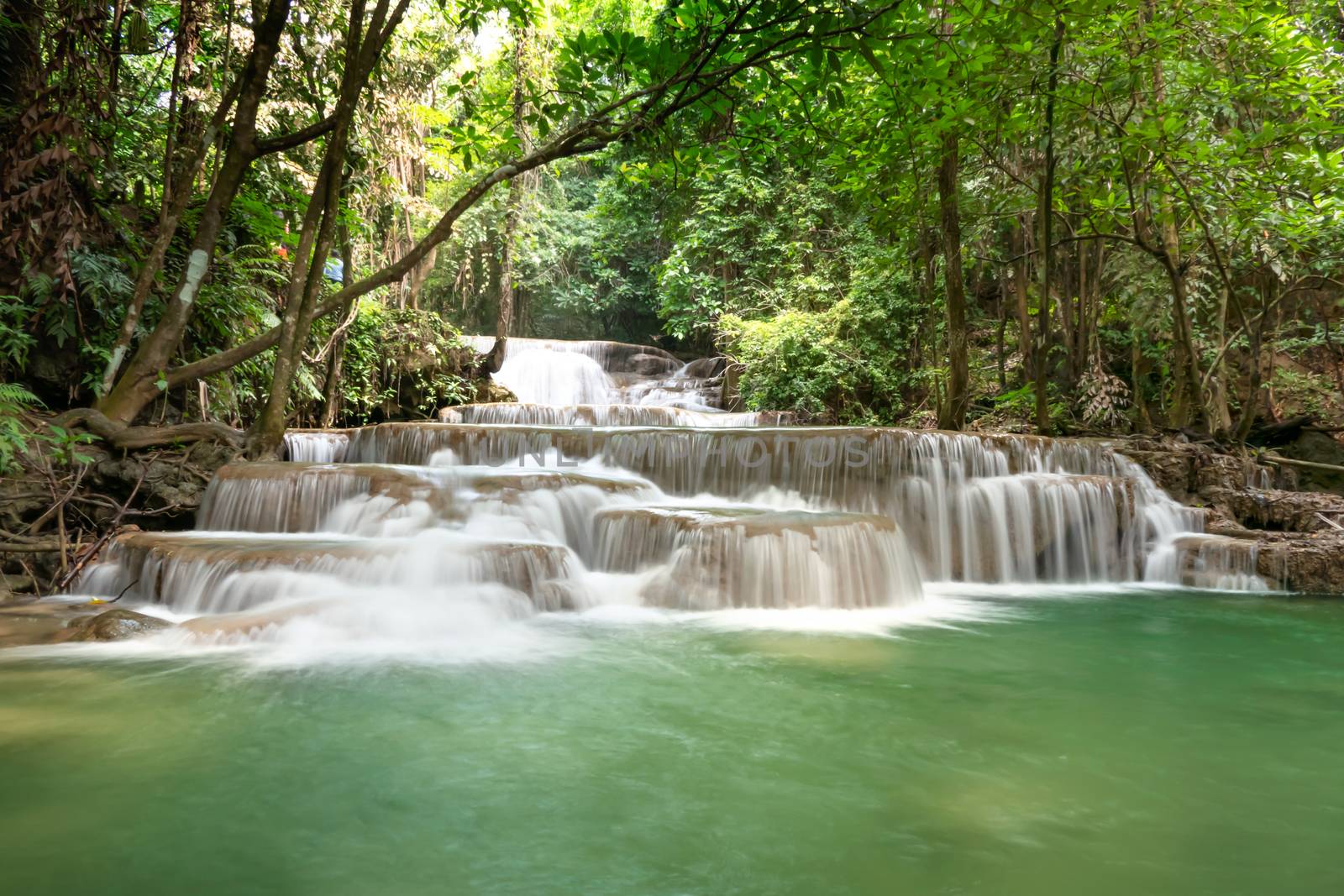 Fresh waterfall in rainforest at National Park, Thailand.