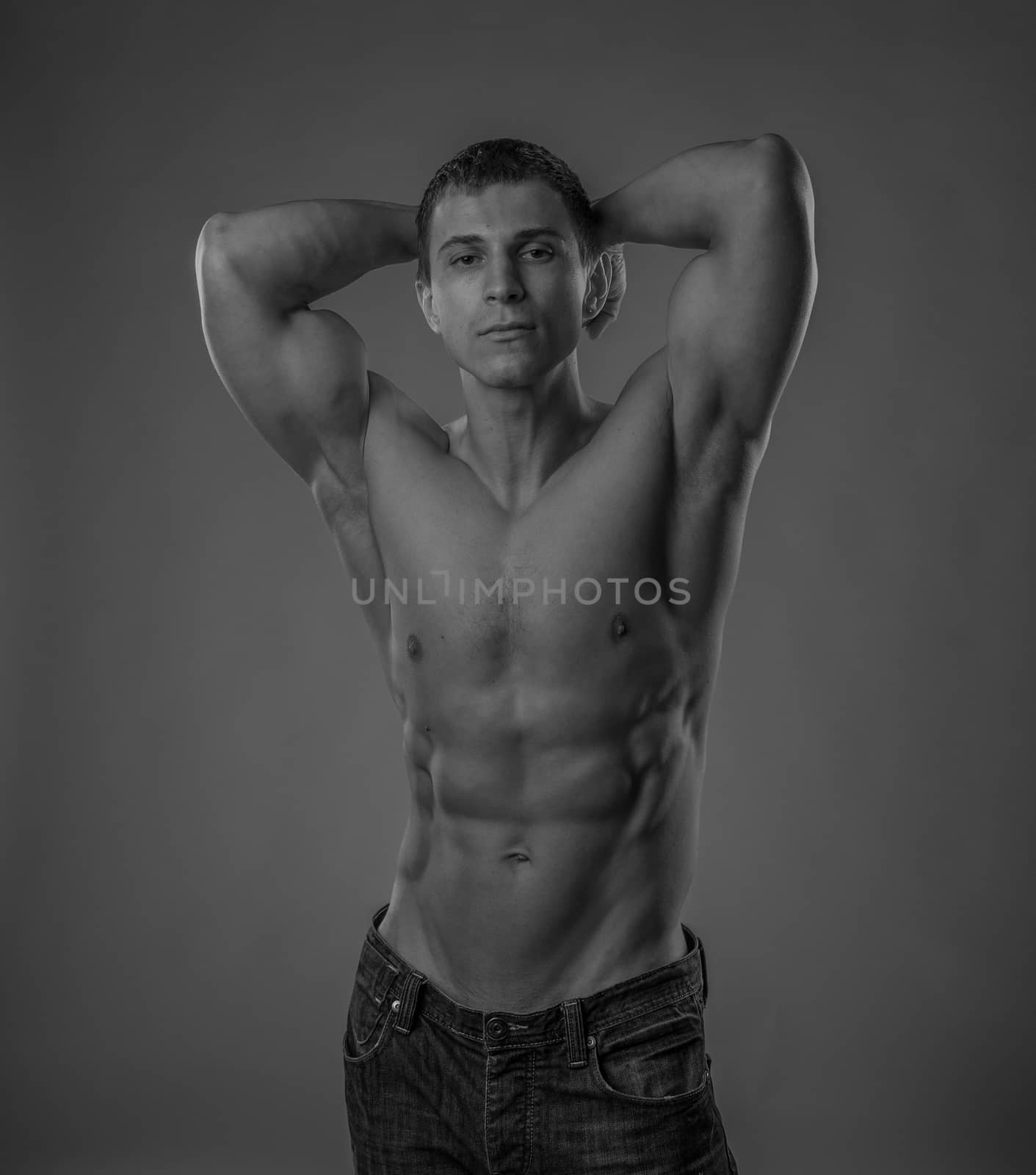 Perfectly fit shirtless young man by Alex_L