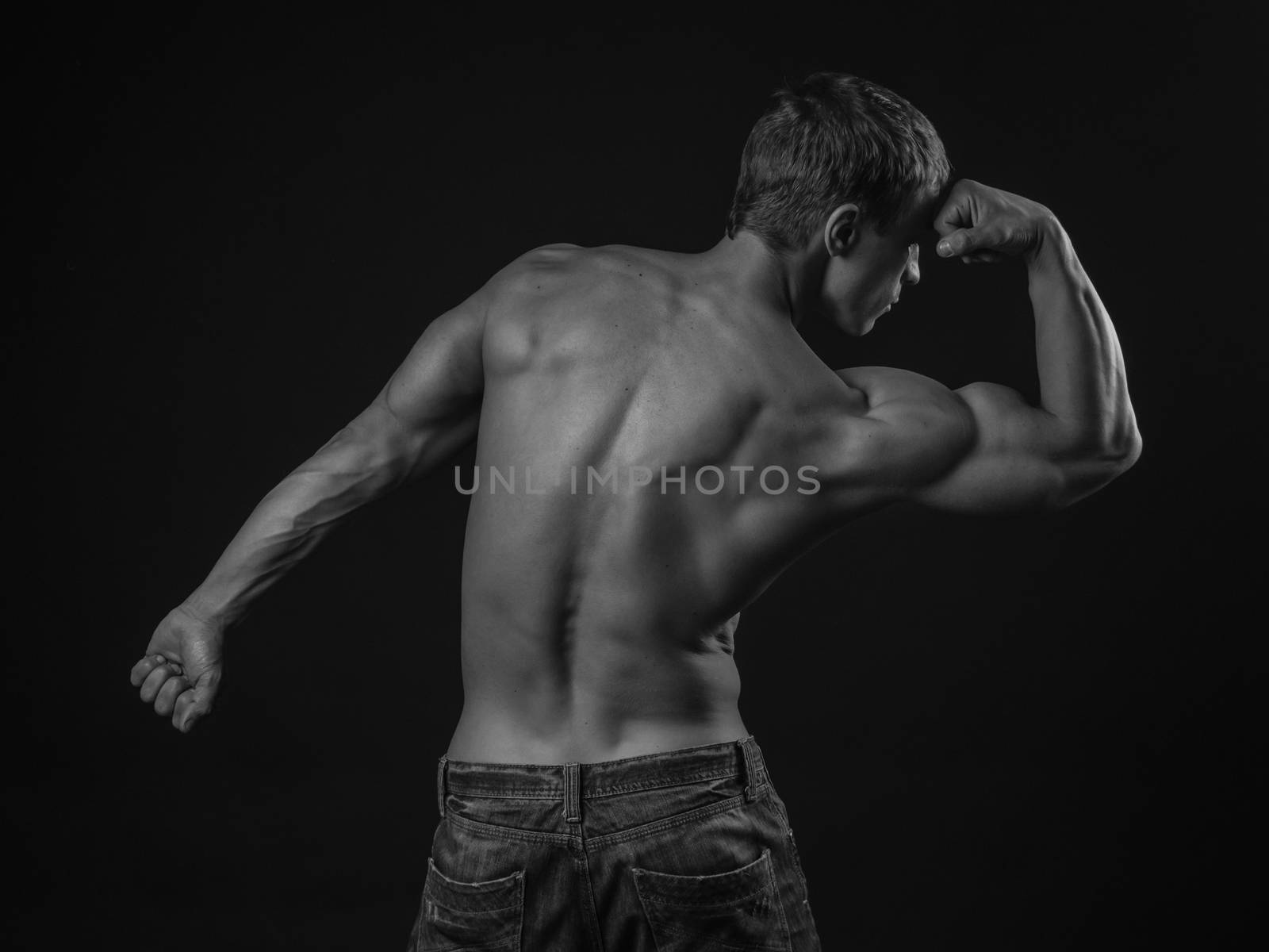 Back of a muscular athlete by Alex_L