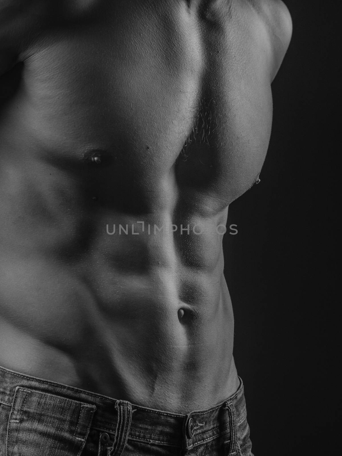 Abdominal muscles of a fit young man by Alex_L