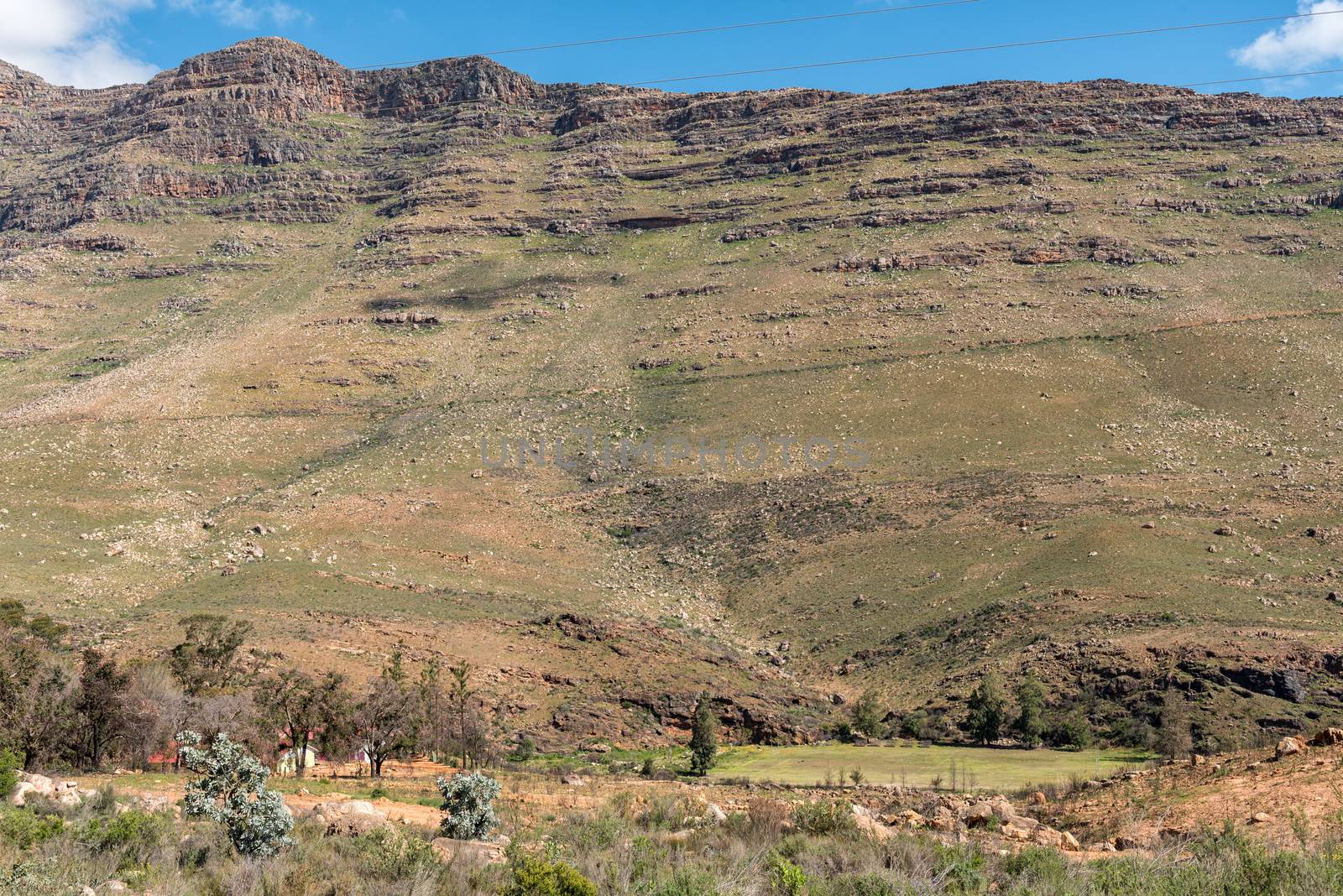 A view of Skilpaddorp in the Cederberg Mountains of the Western Cape Province of South Africa. A school building and rugby field are visible