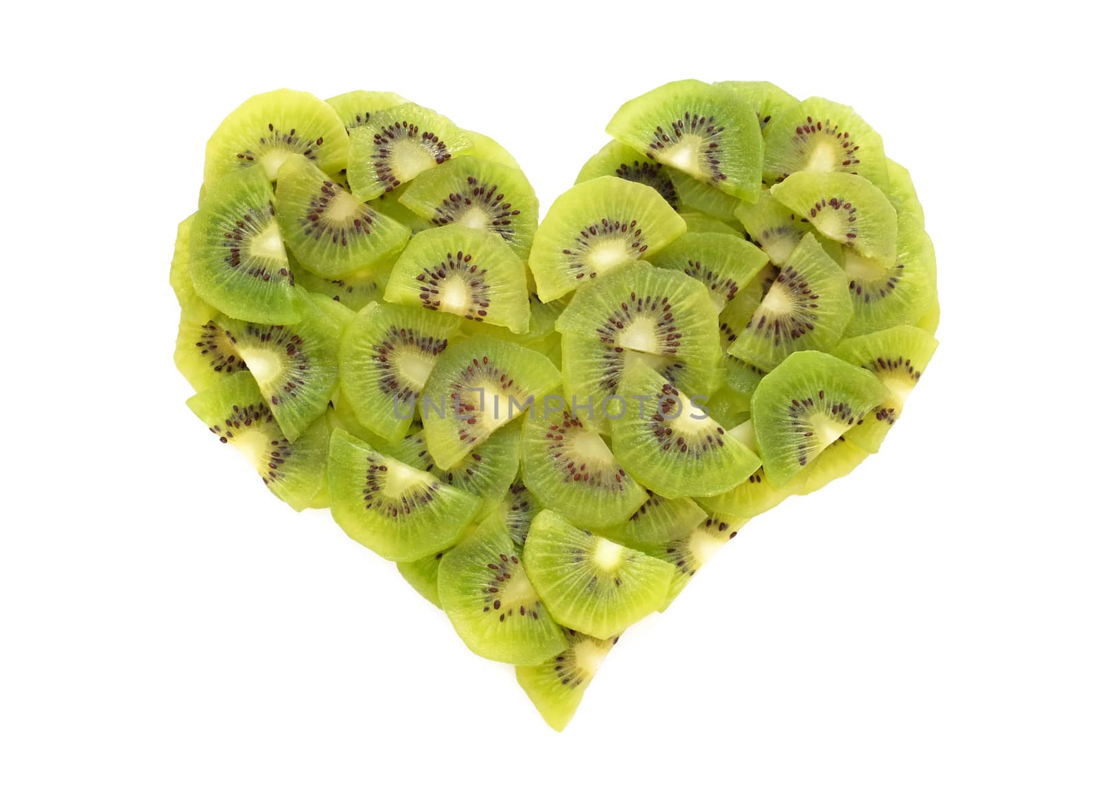 Pieces of fresh kiwi fruit in a heart shape, isolated on white background