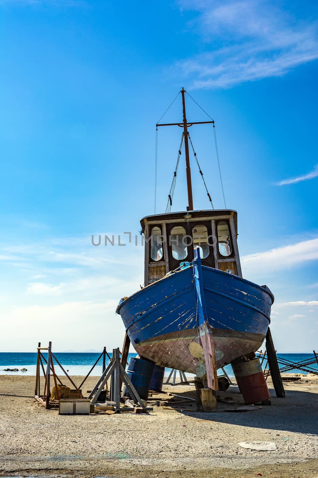 Old fishing boat pulled out of the water, Patras.