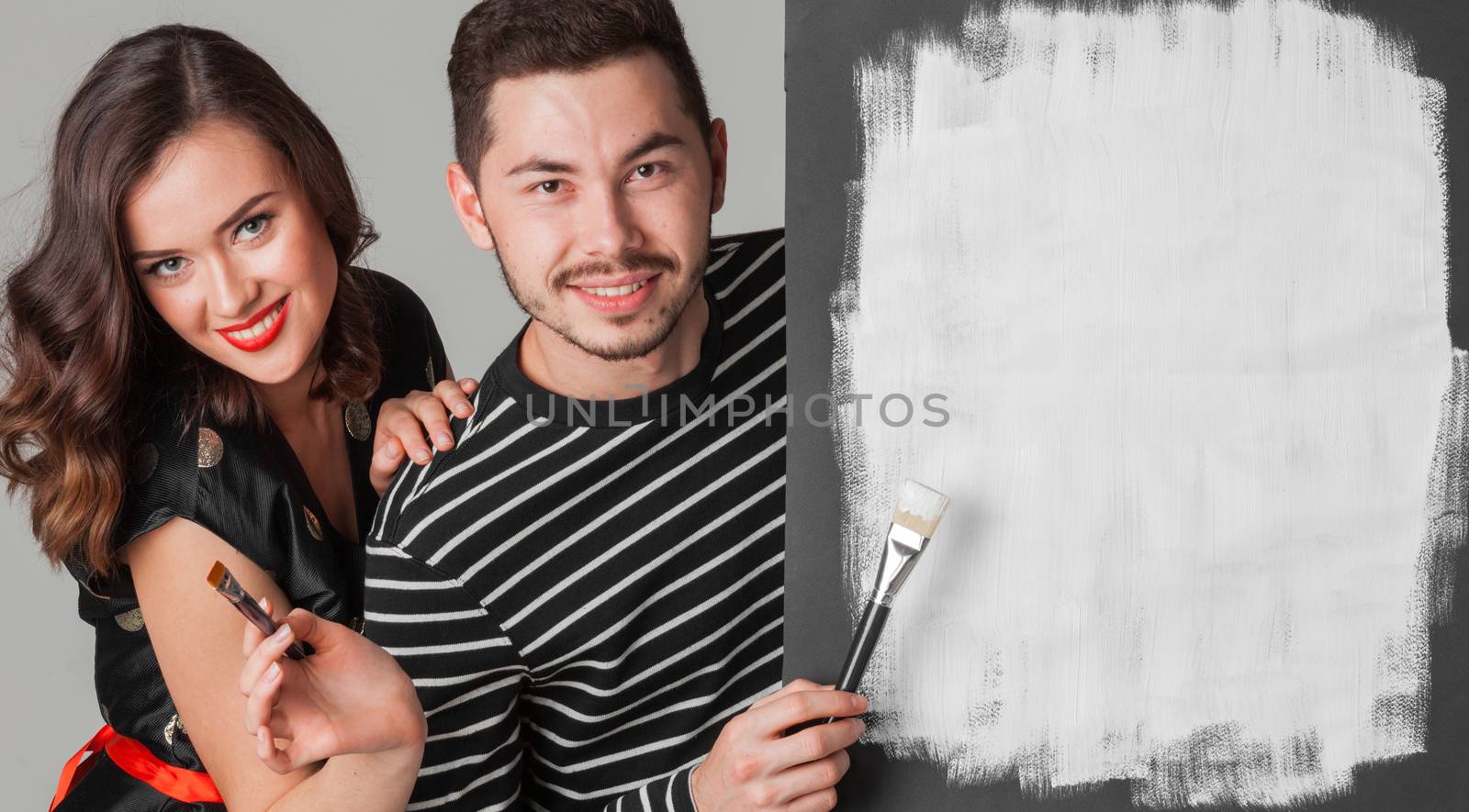 Couple with paint brushes by Yellowj