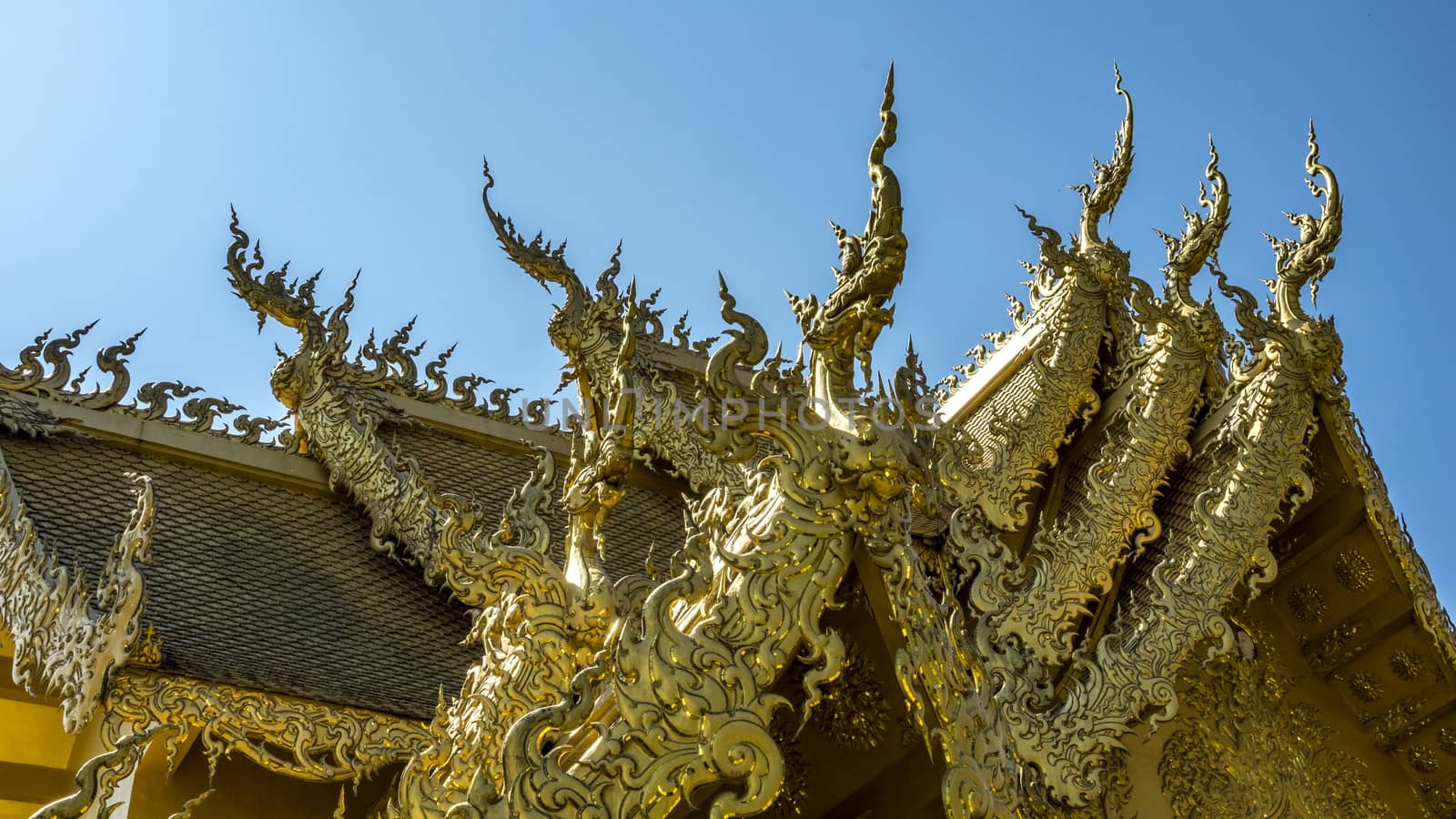 the eaves of bridge in Wat Rong Khun (white temple) of Chiang Mai, Thailand.