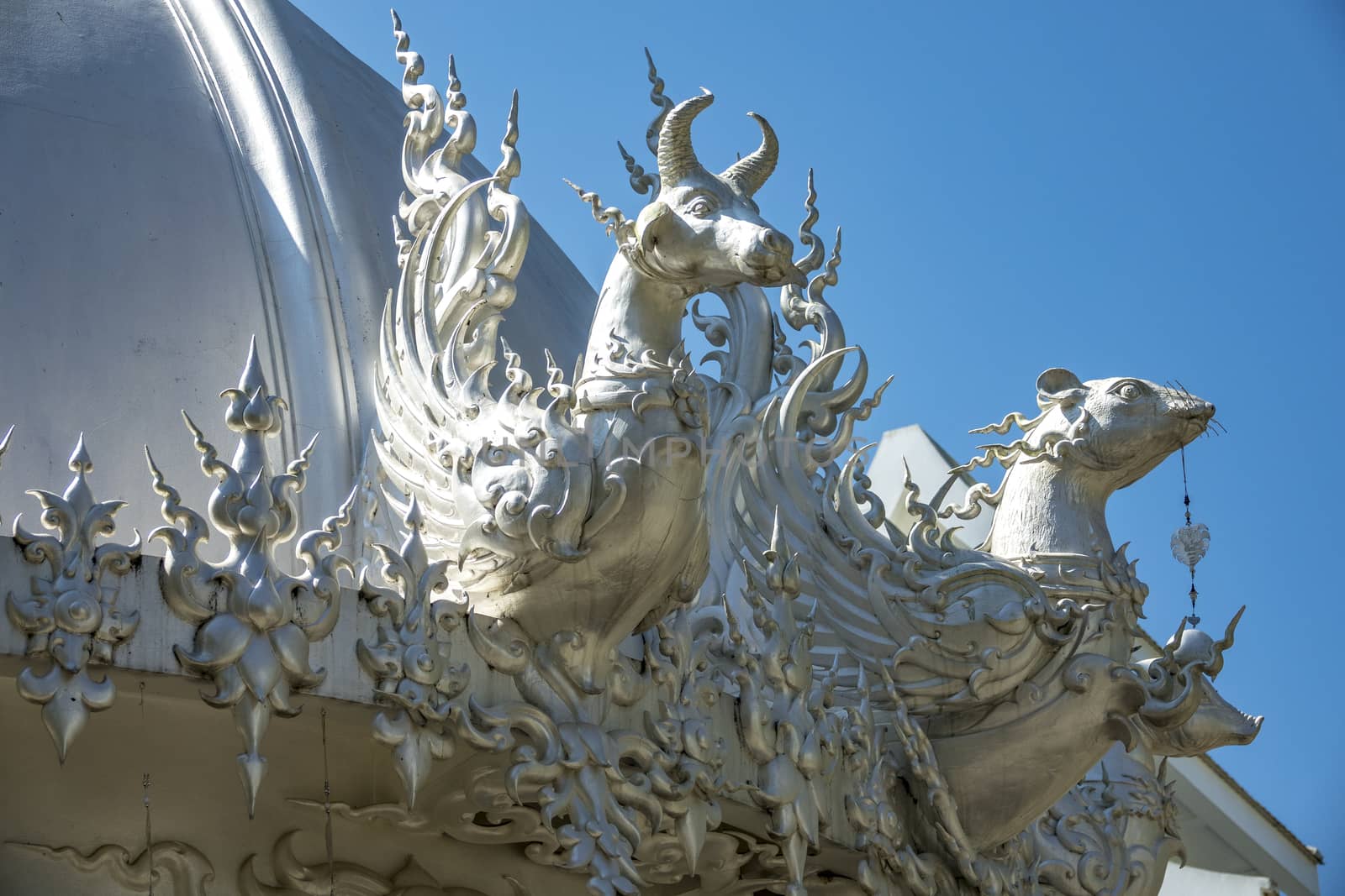 the eaves of Wat Rong Khun (white temple) of Chiang Mai, Thailand.