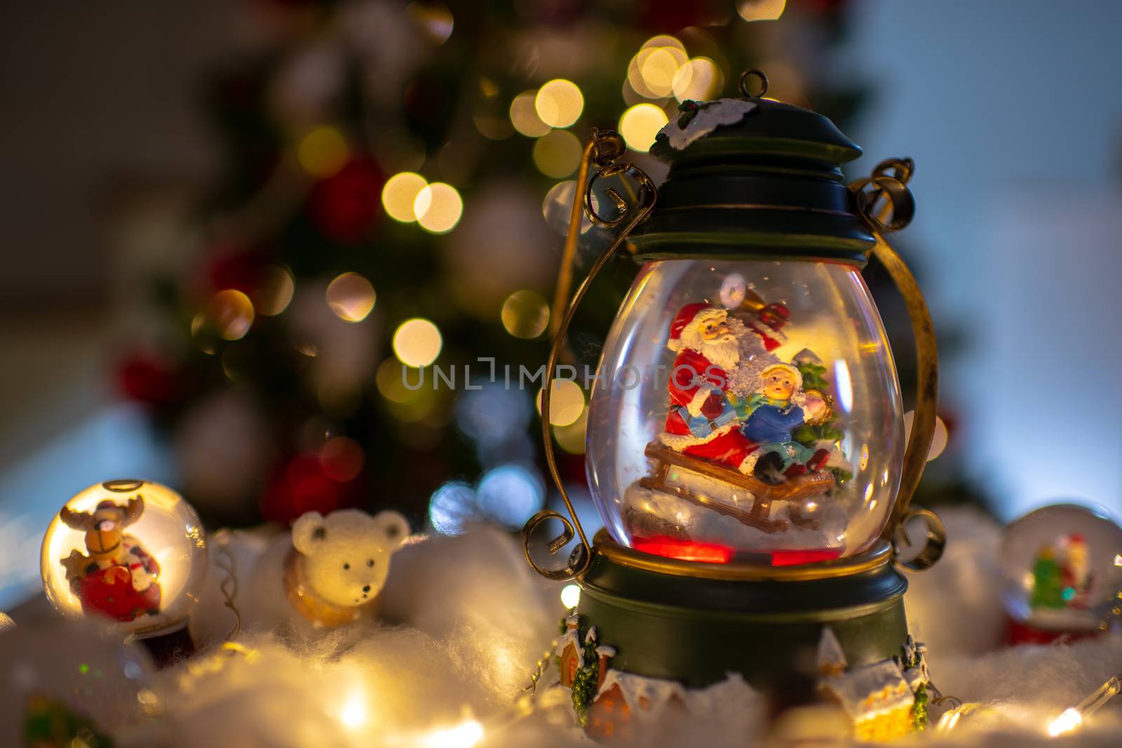 Christmas background with santa in a snow globe by asafaric