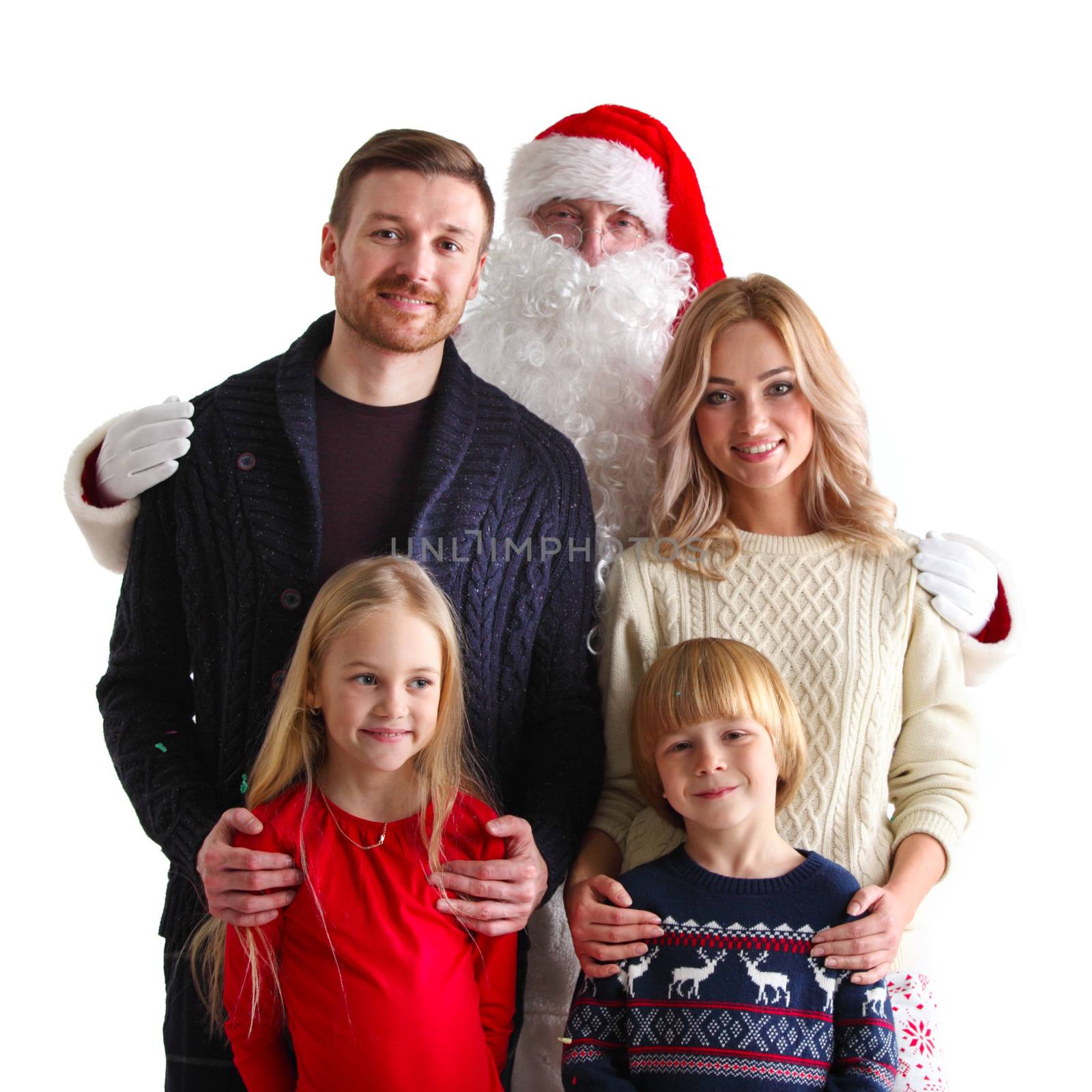 Portrait of young family with two children with Santa Claus, isolated on white background