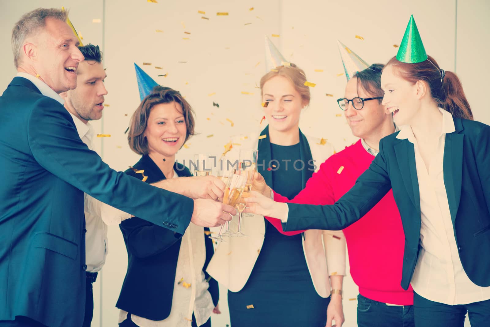 Business people celebrating New Year at office party