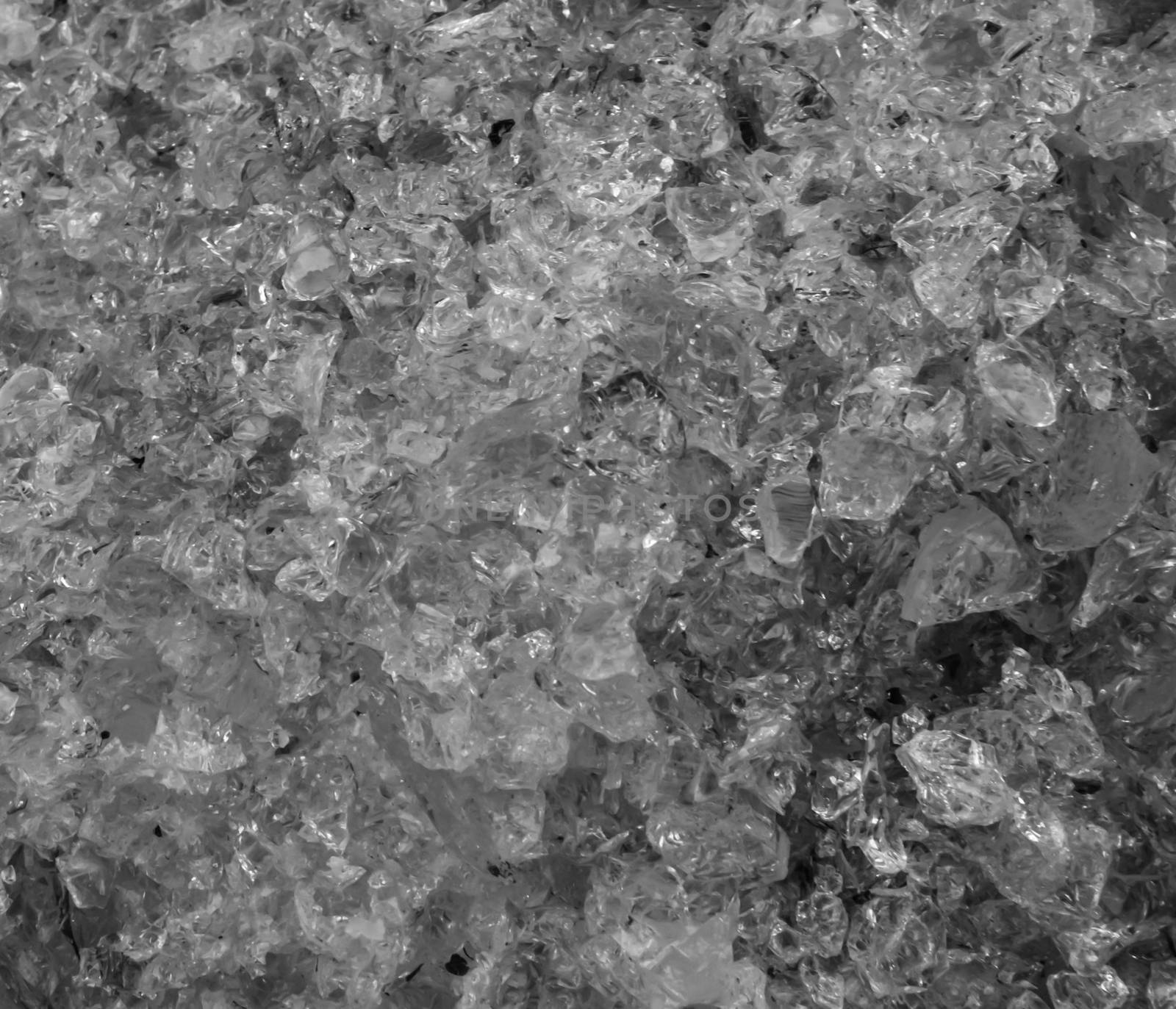 pattern of some crushed glass crystals in macro closeup, a black and white texture background by charlottebleijenberg