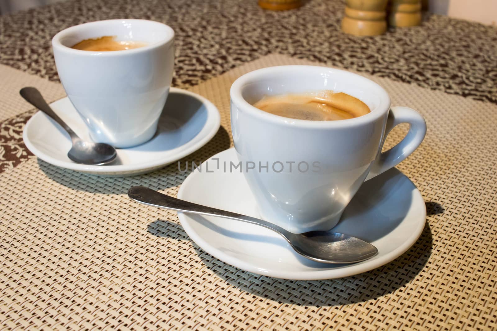 Still-life, two white coffee cups, serving plates, small metal s by VeraVerano