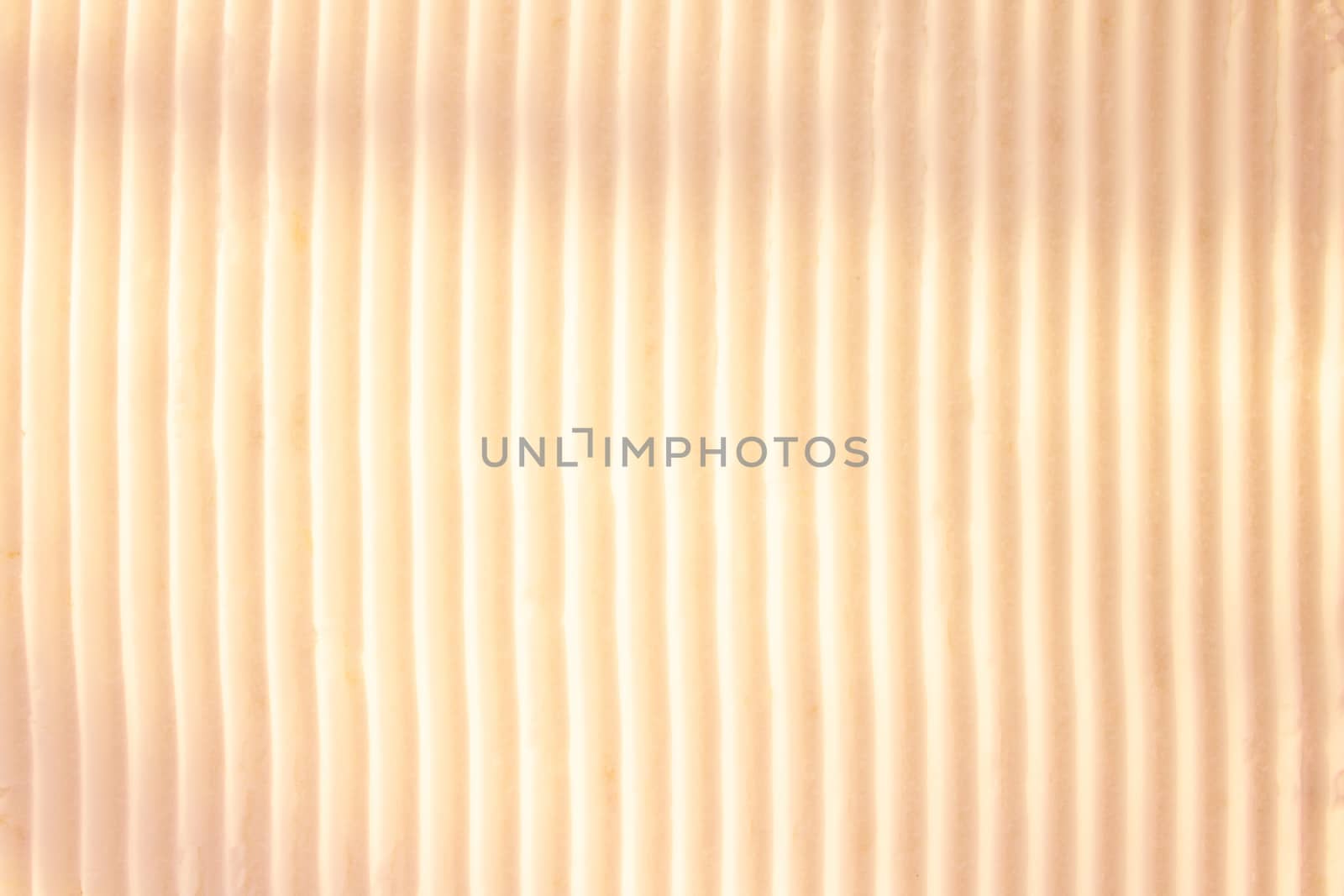 Background of vertical geometrical parallel stripes of snow colored with light shade