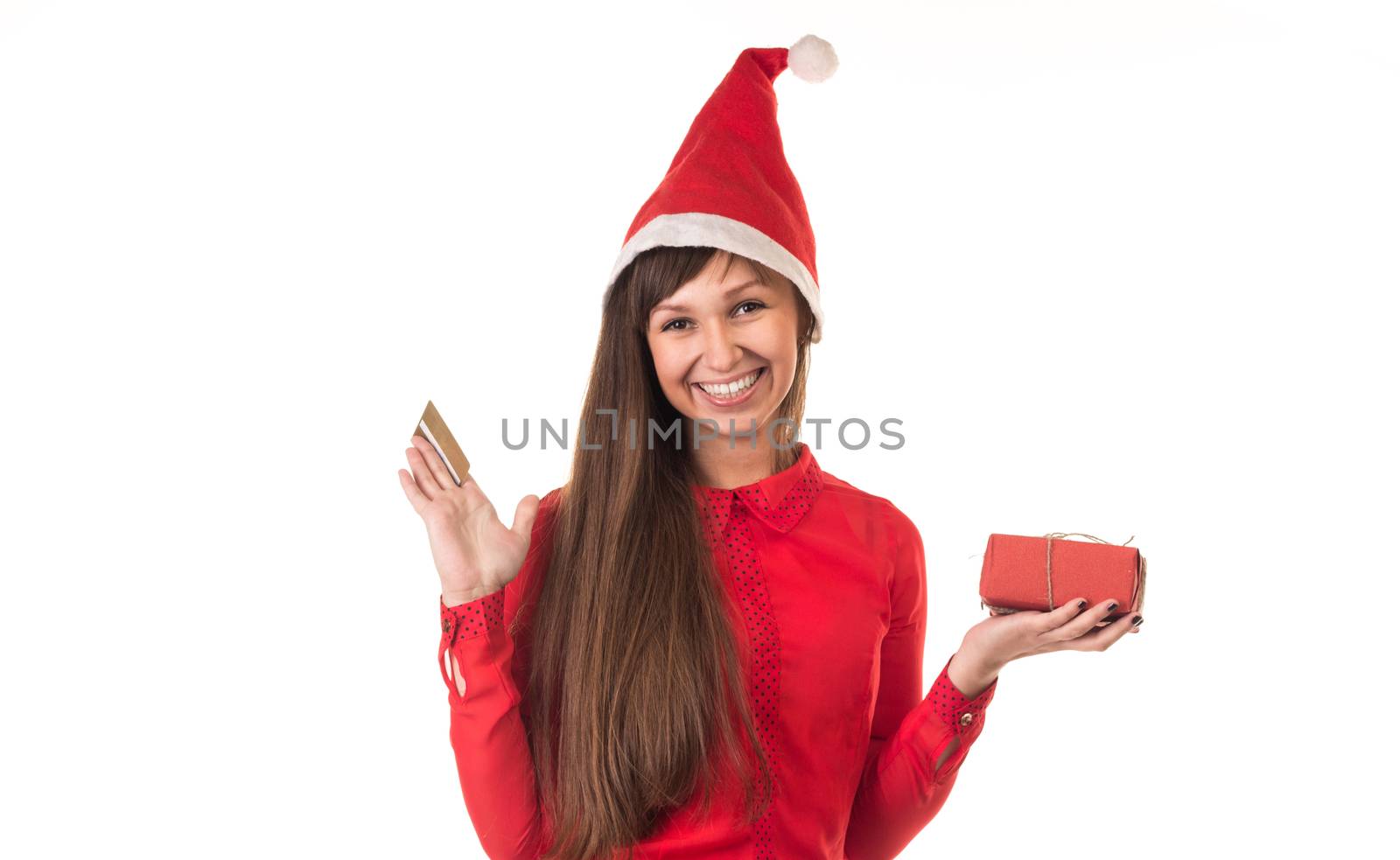 Girl in christmas cap with credit card and red box by VeraVerano