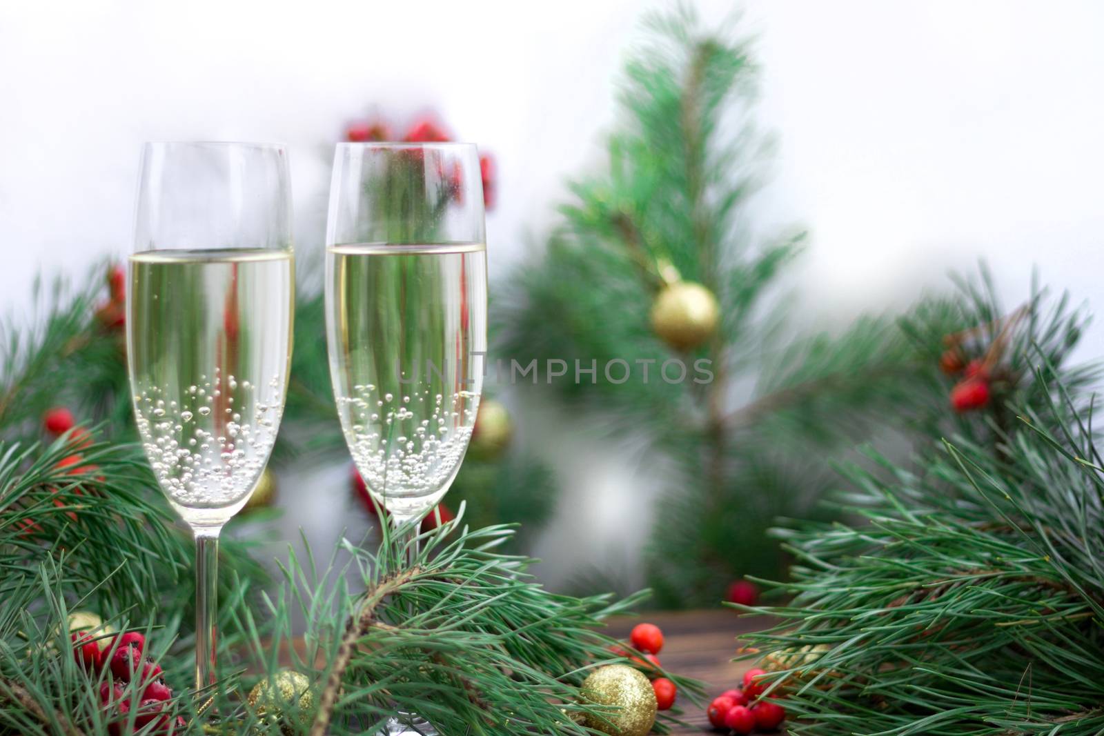 Christmas composition, champaign glasses, pine branches, red row by VeraVerano