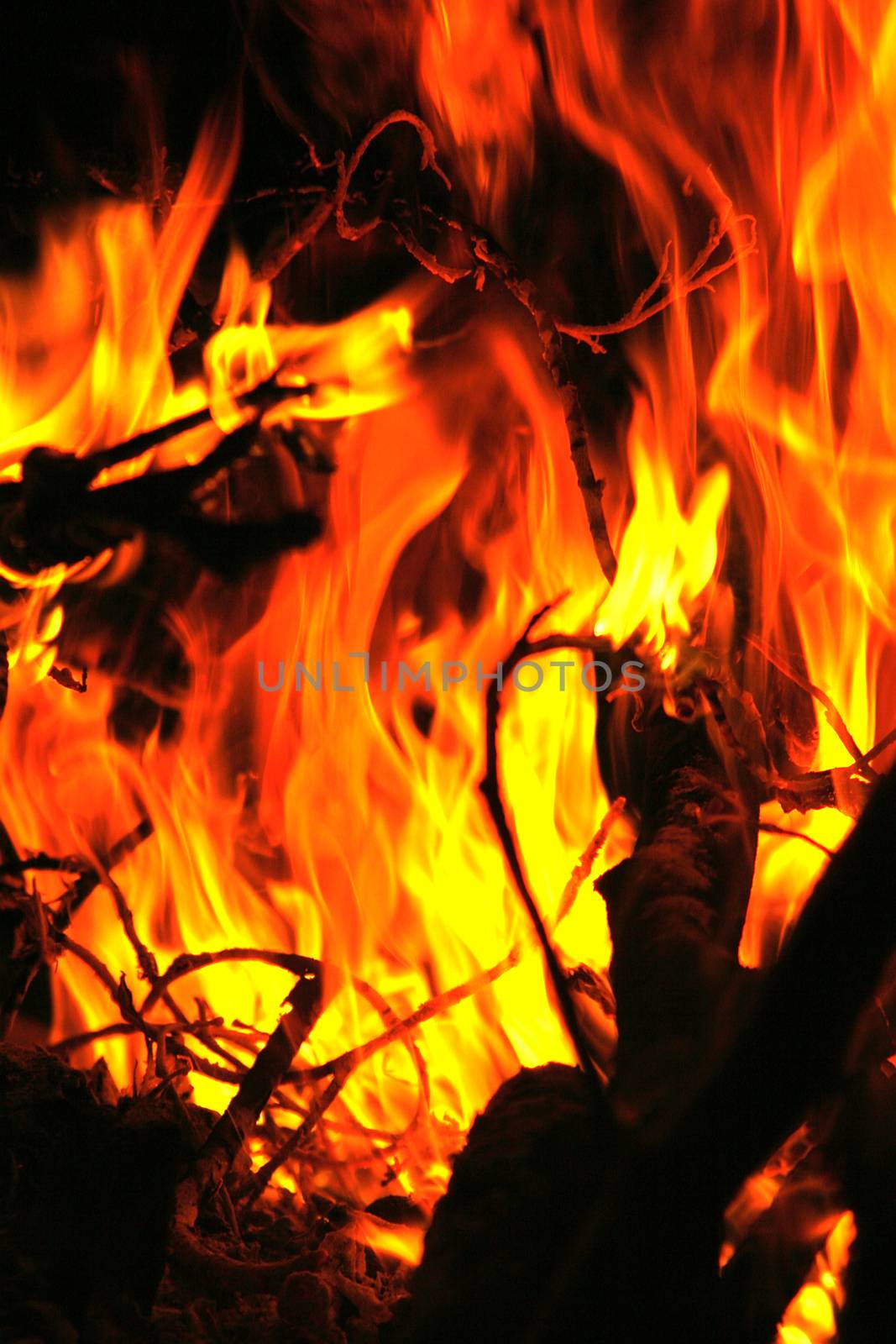 Close photo of flames in the fireplace