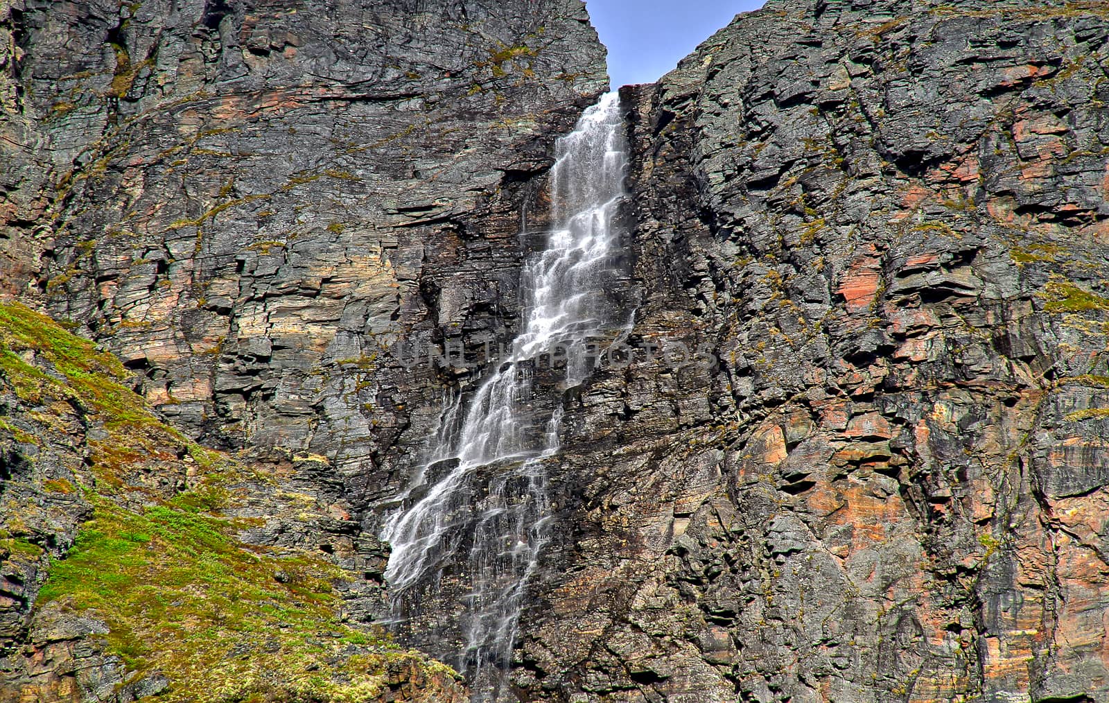 A long waterfall by Valokuva24