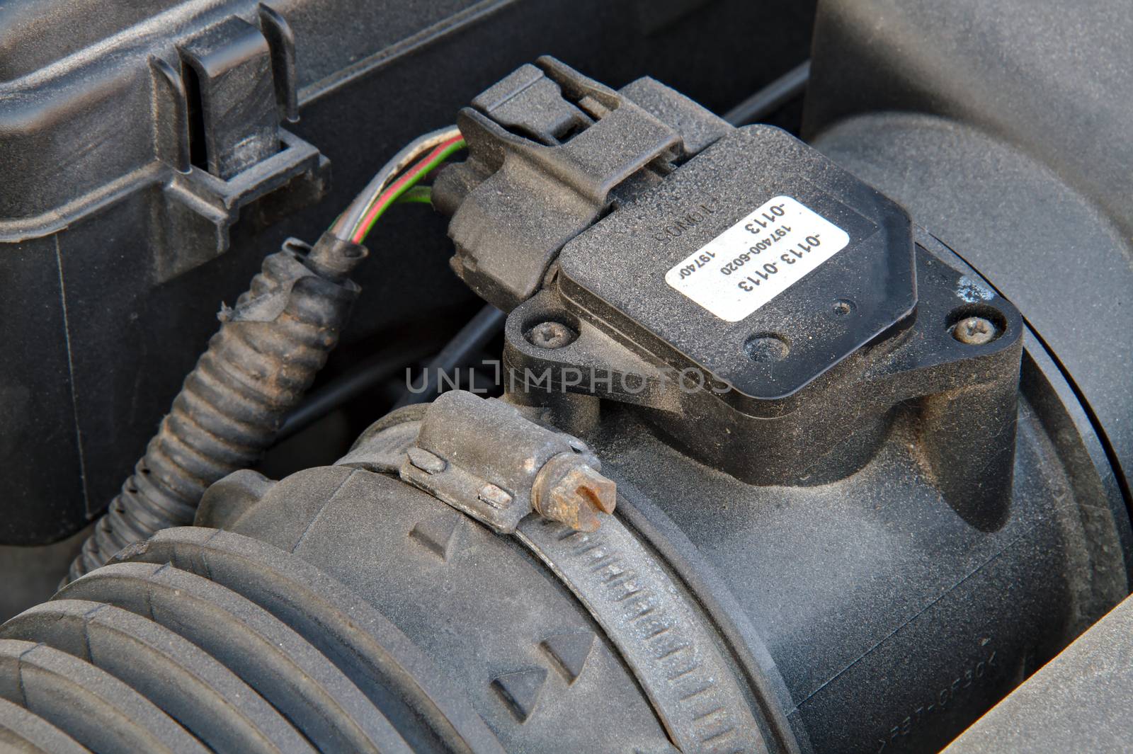 Mass air flow sensor of a car at the air filter housing.