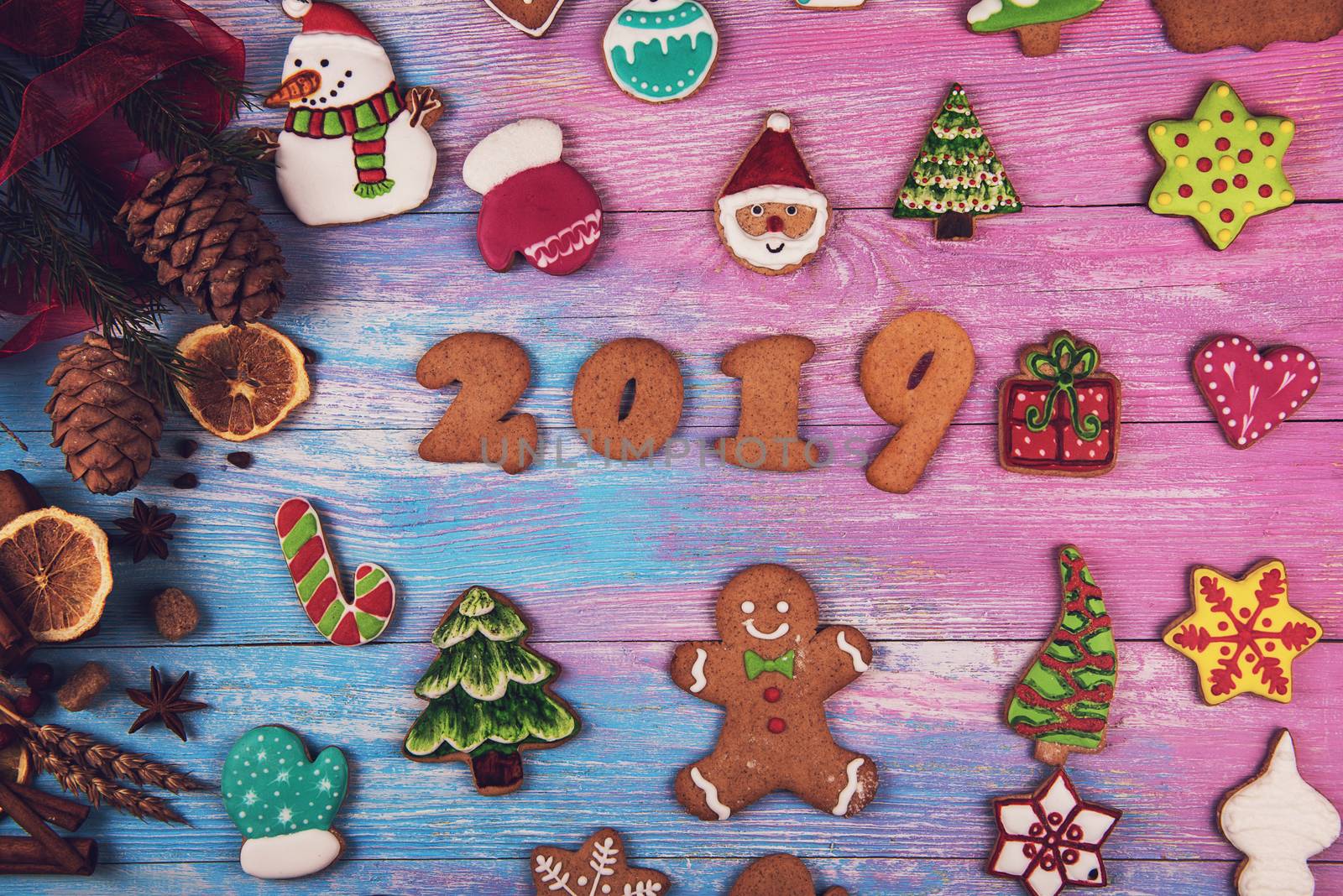 Gingerbreads for new 2019 year on wooden background, xmas theme