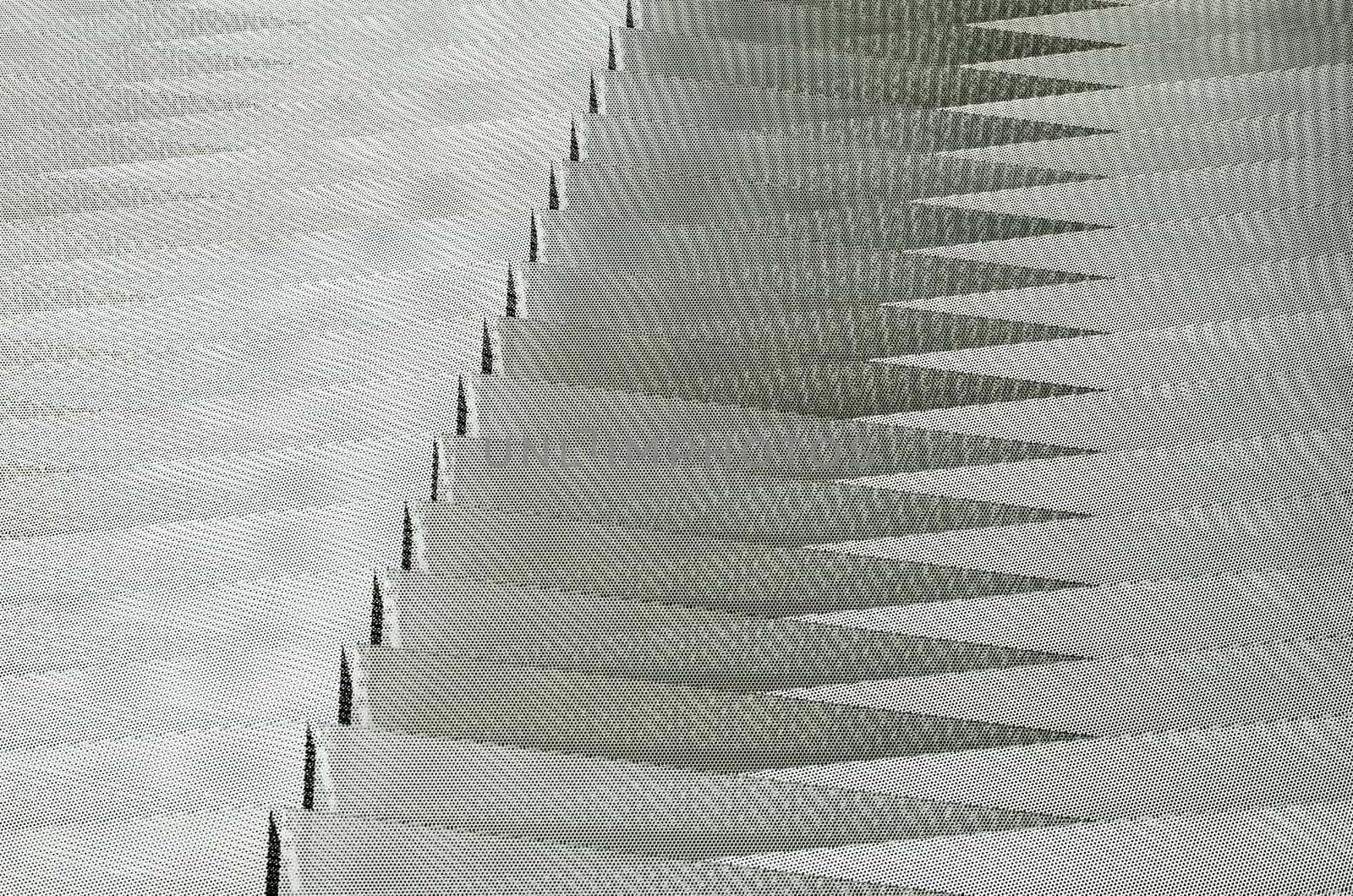 Detail of the metallic pattern from the face of the Navarrabiomed building in Pamplona, Navarra, Spain
