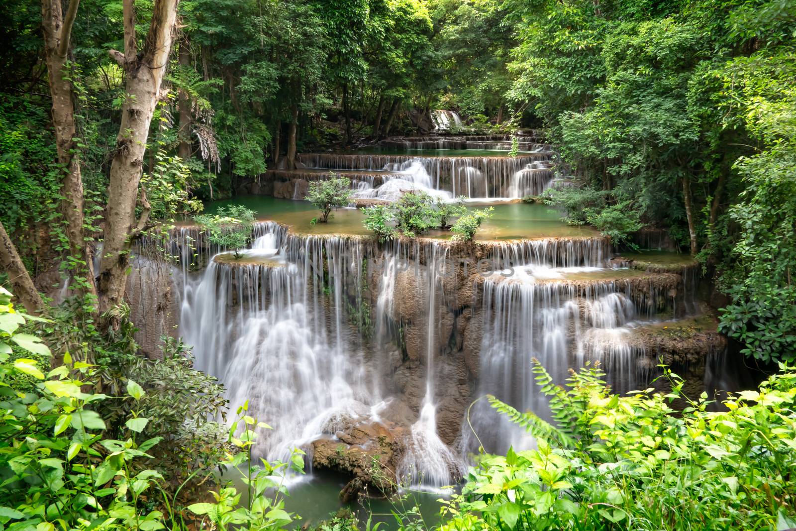 Fresh waterfall in rainforest at National Park, Thailand.