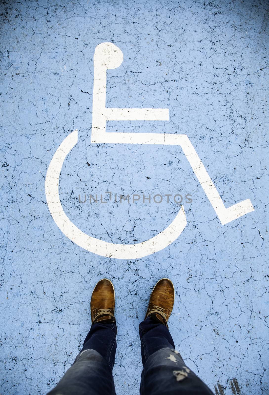 Disabled sign on the asphalt by esebene