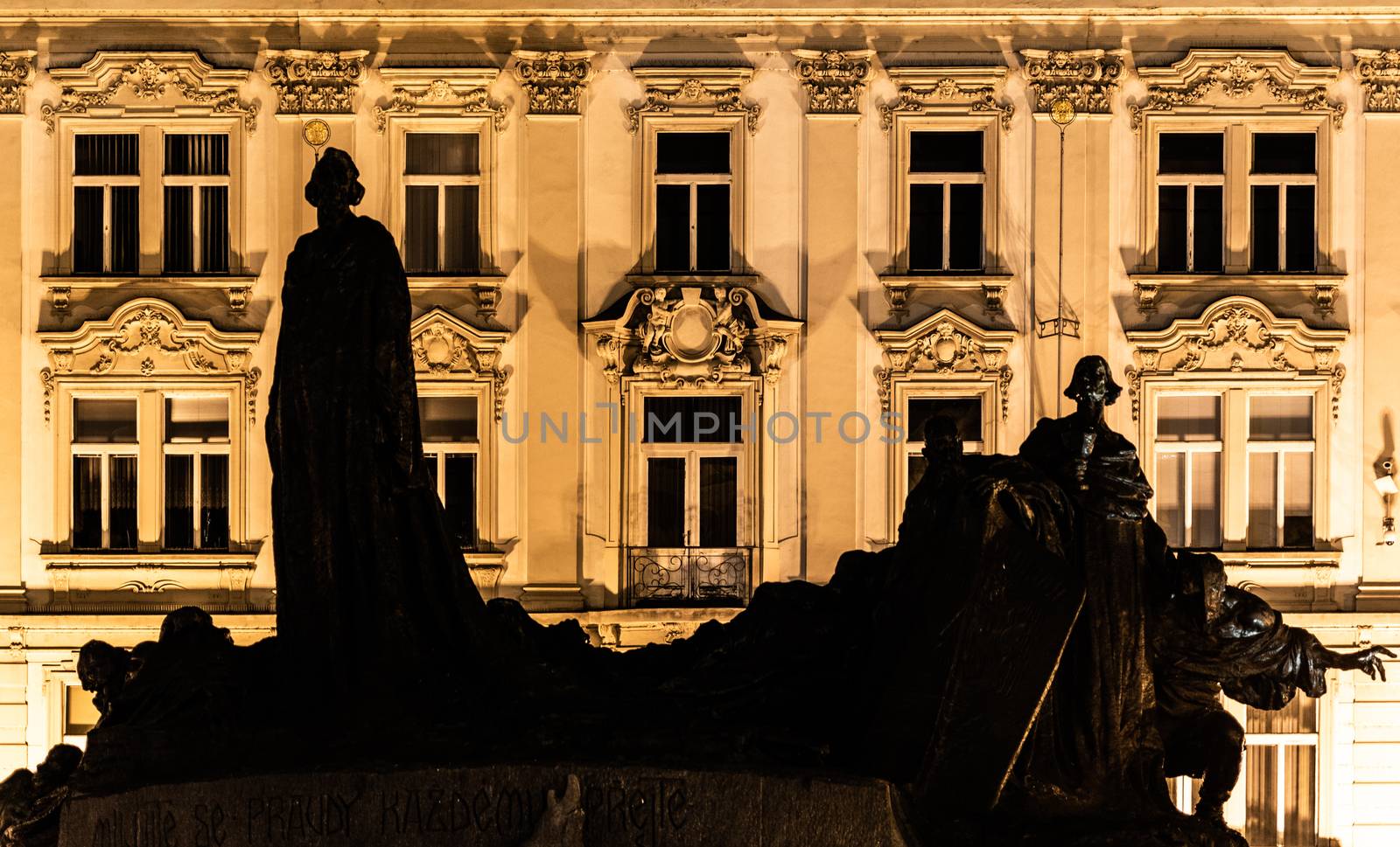 Silhouette of Jan Hus Memorial at Old Town Square by night. Prague, Czech Republic by pyty